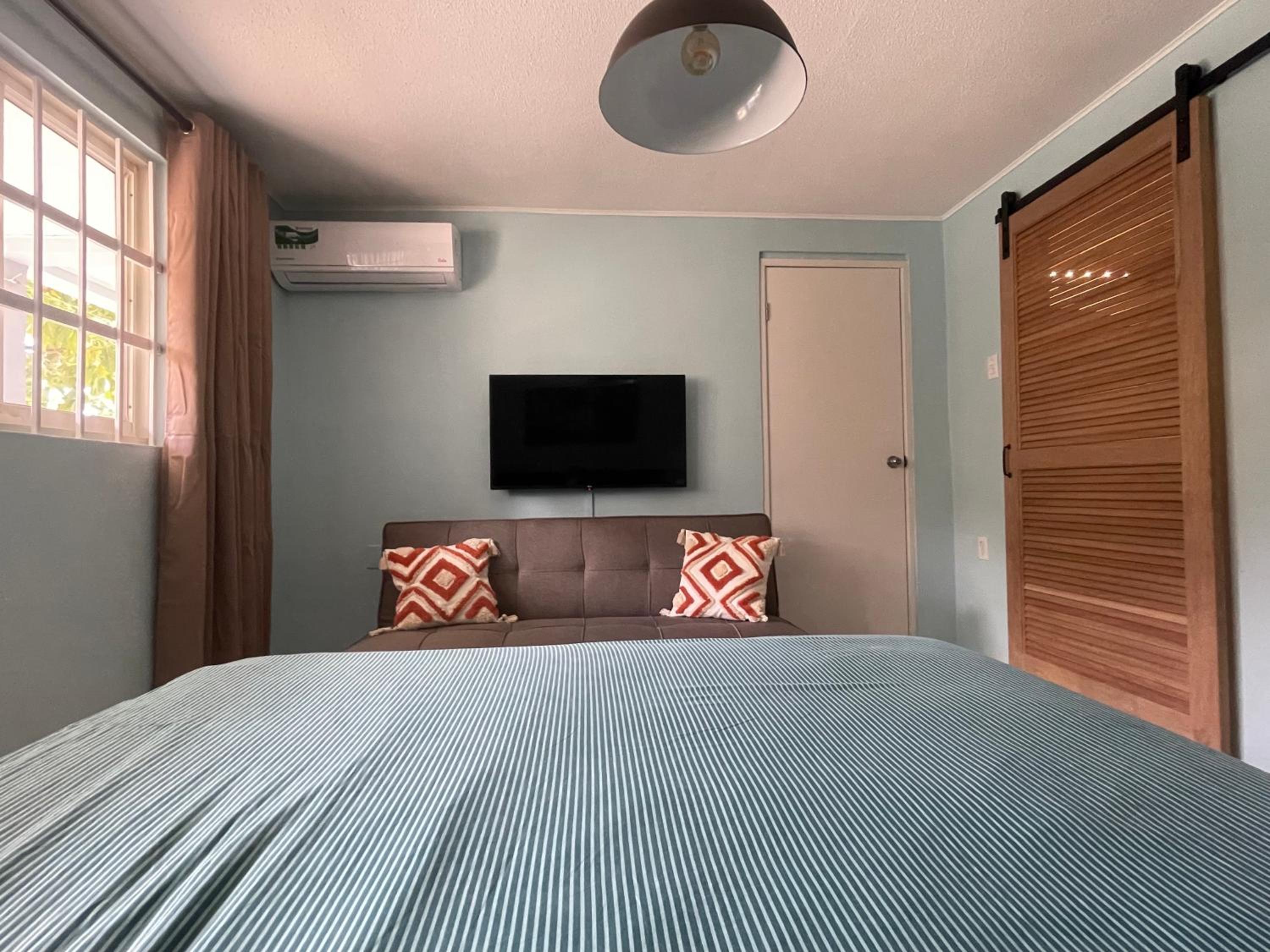 Kas di BaMi A-194 op Seru Coral Resort - Ruim appartement met groot zwembad en tropische tuin