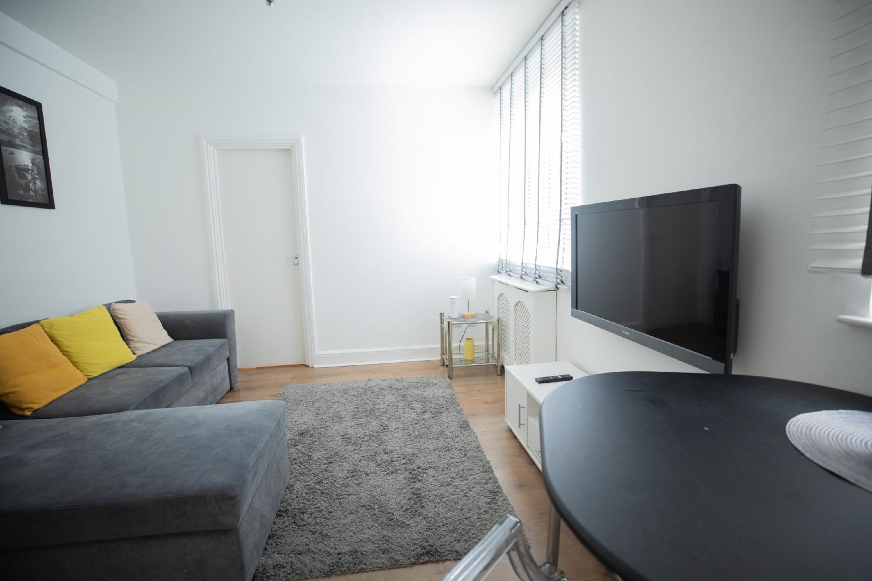 One bedroom at Chelsea cloister Hotel