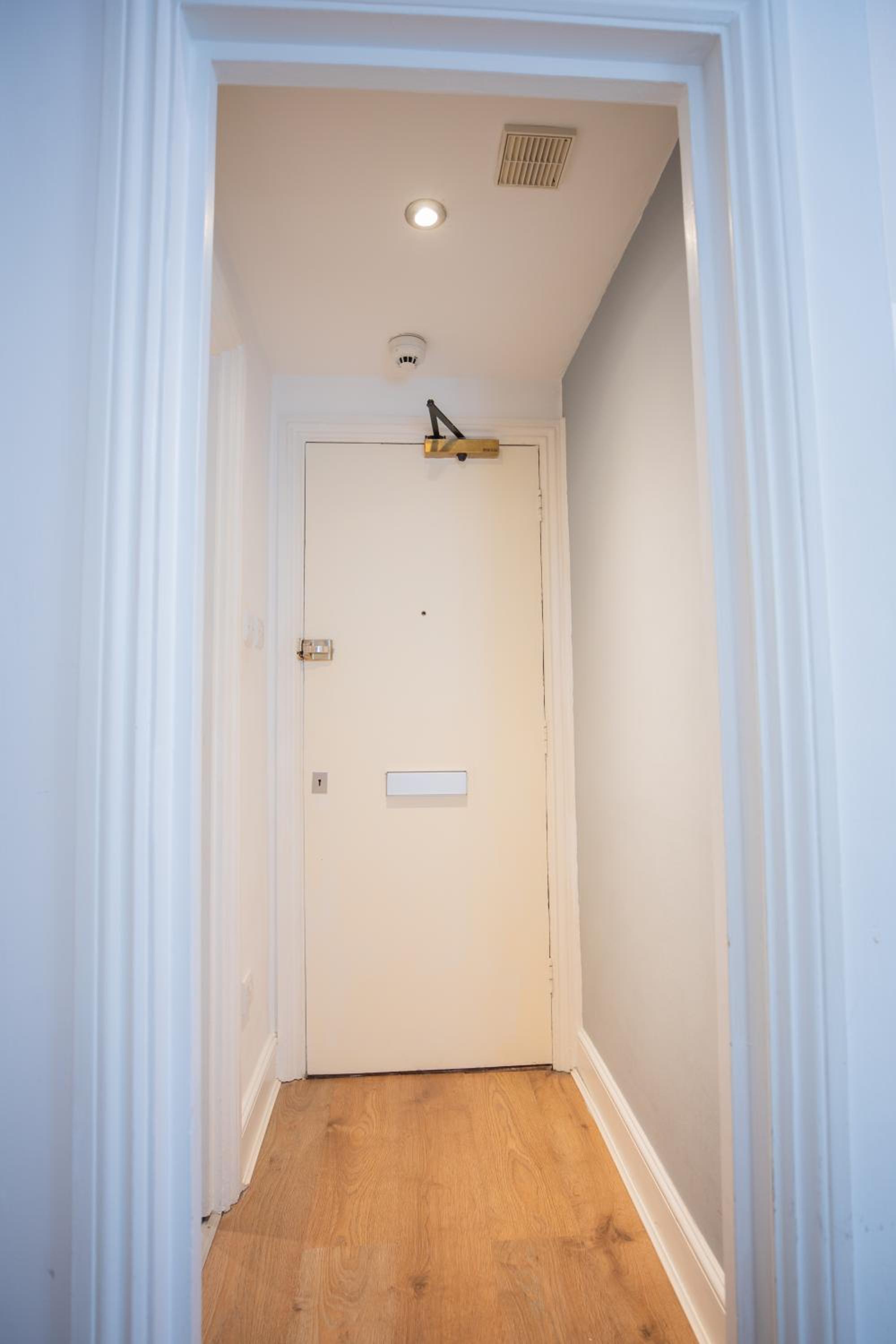 One bedroom at Chelsea cloister Hotel