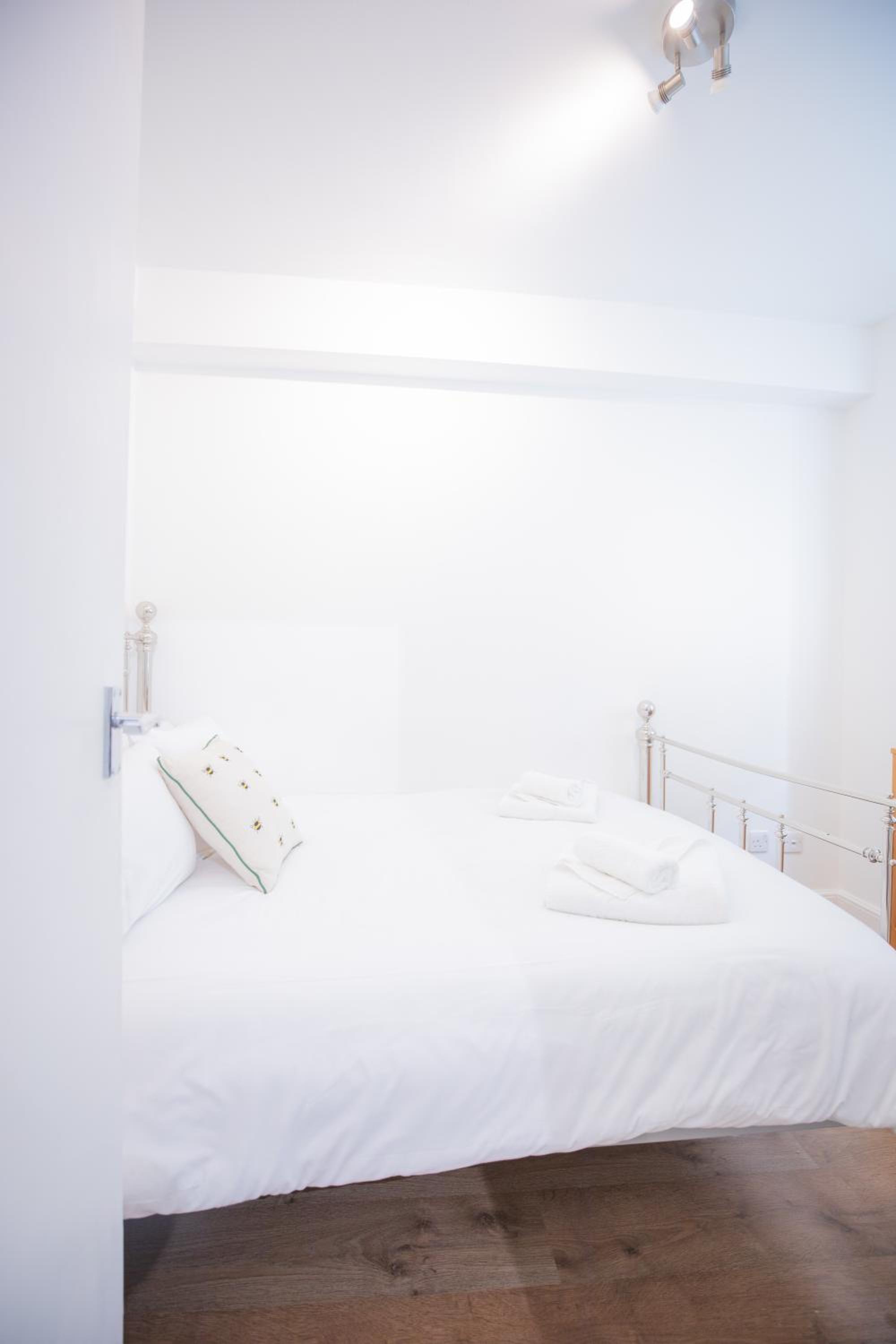 One bedroom at Chelsea cloister Hotel