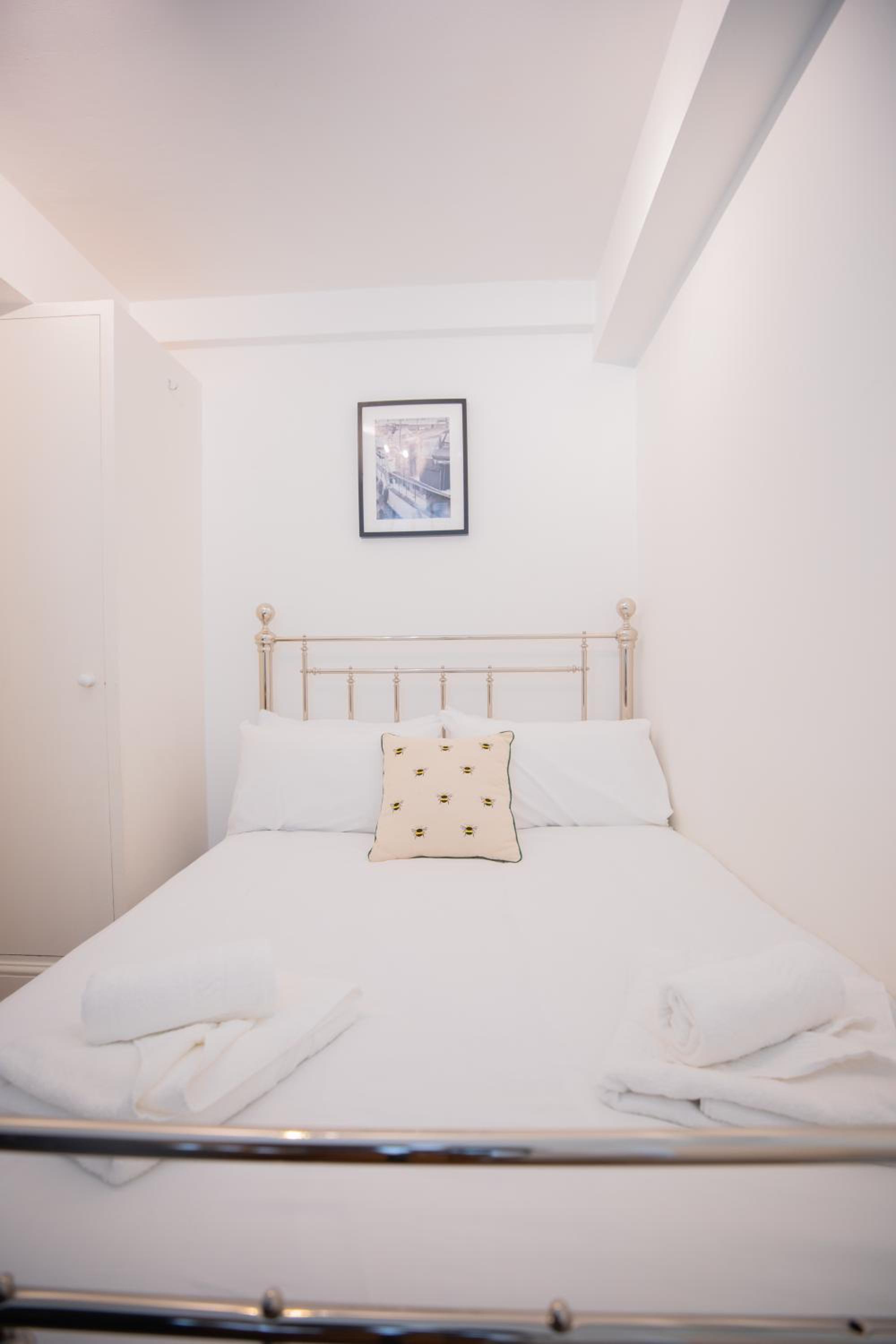 One bedroom at Chelsea cloister Hotel