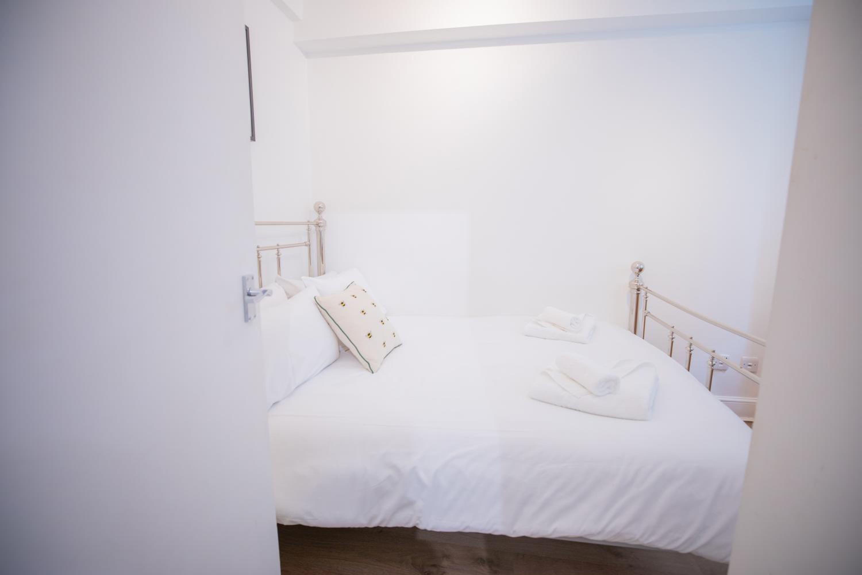 One bedroom at Chelsea cloister Hotel