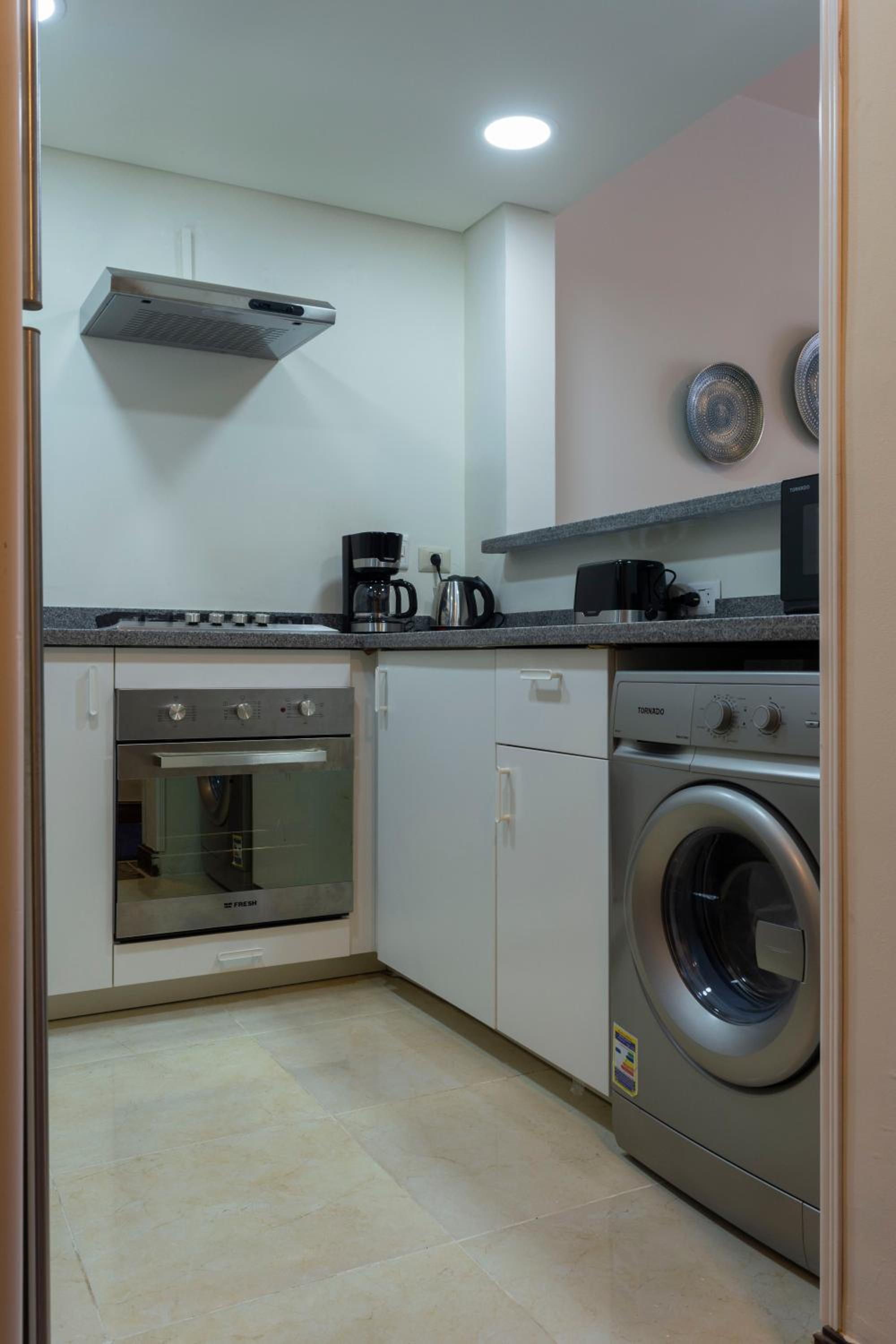Sunny Duplex with Pool access in Porto-NewCairo Mall
