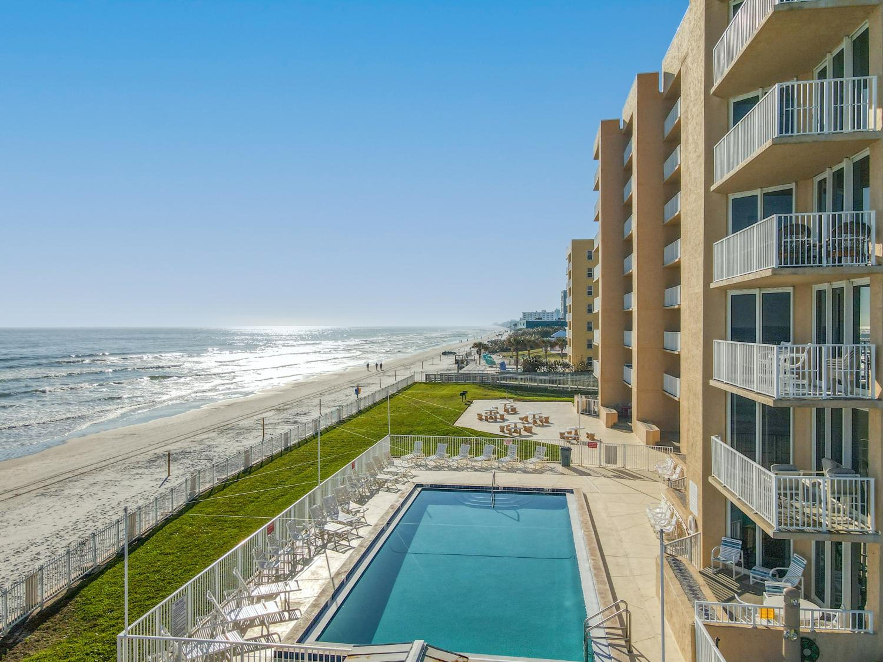 Beachfront, Pool, BBQ & Game room! Extra Windows = More Light & More Views view 3
