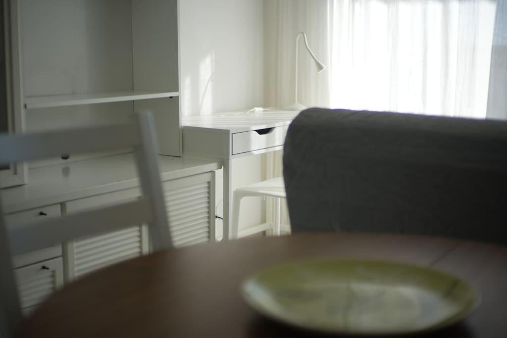 Quiet Studio in Fenals with Balcony, Pool and Workspace for Medium-Term Rental view 3