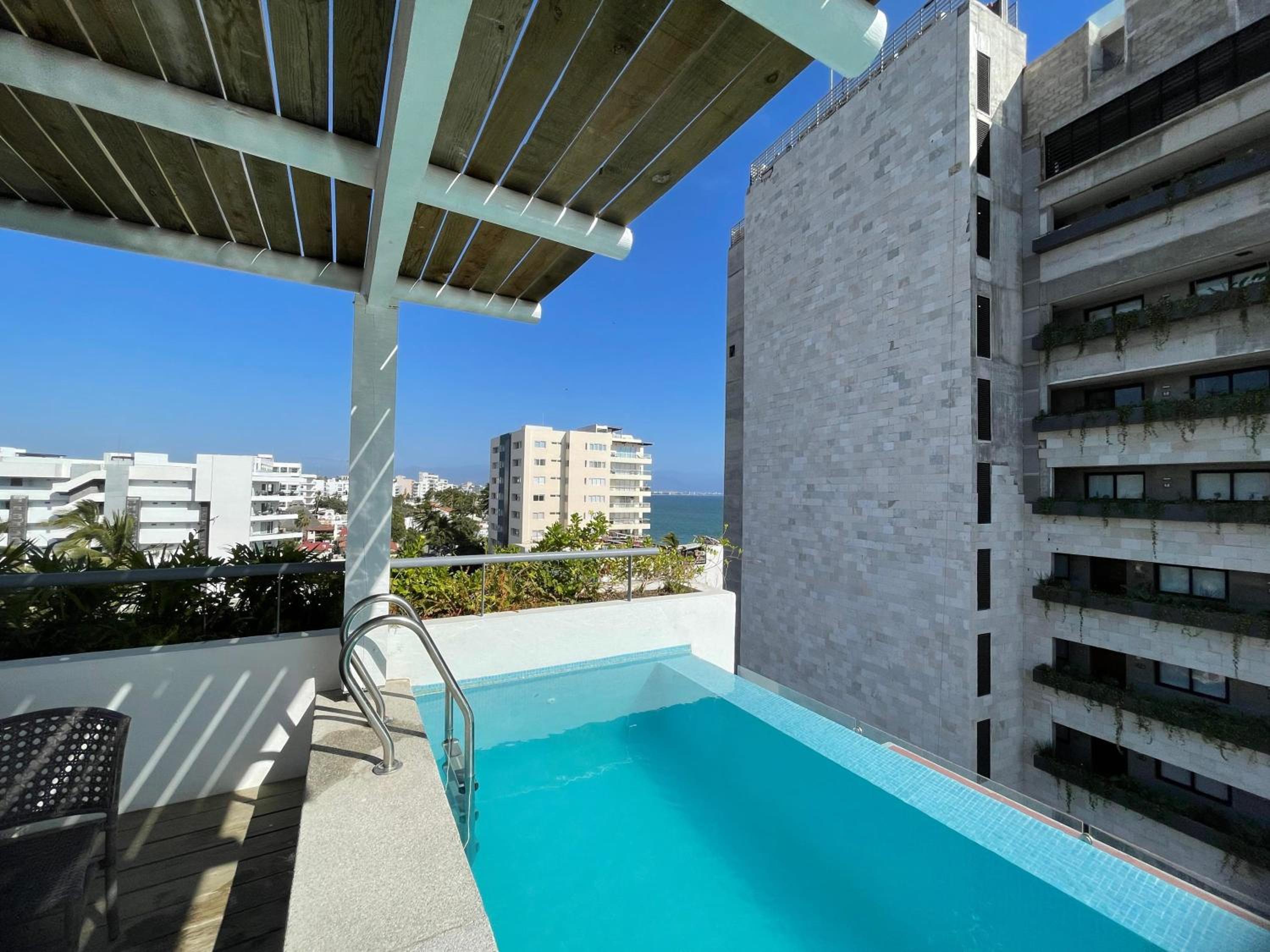 Casa Las Palmas - Condos by the Beach with Rooftop Pool view 3
