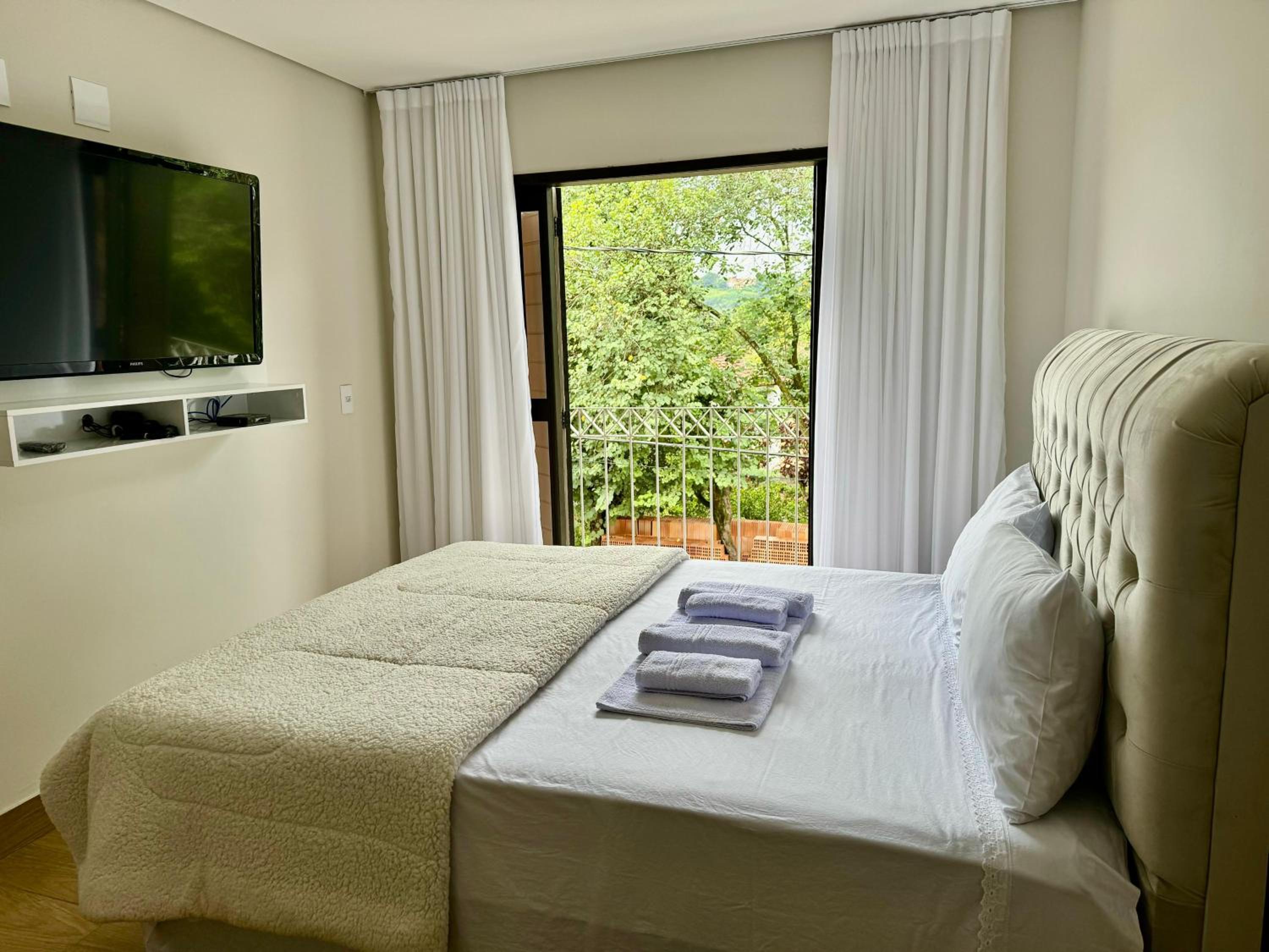 Apartamentos a 200m do centro - Hospedaria Villa da Pedra