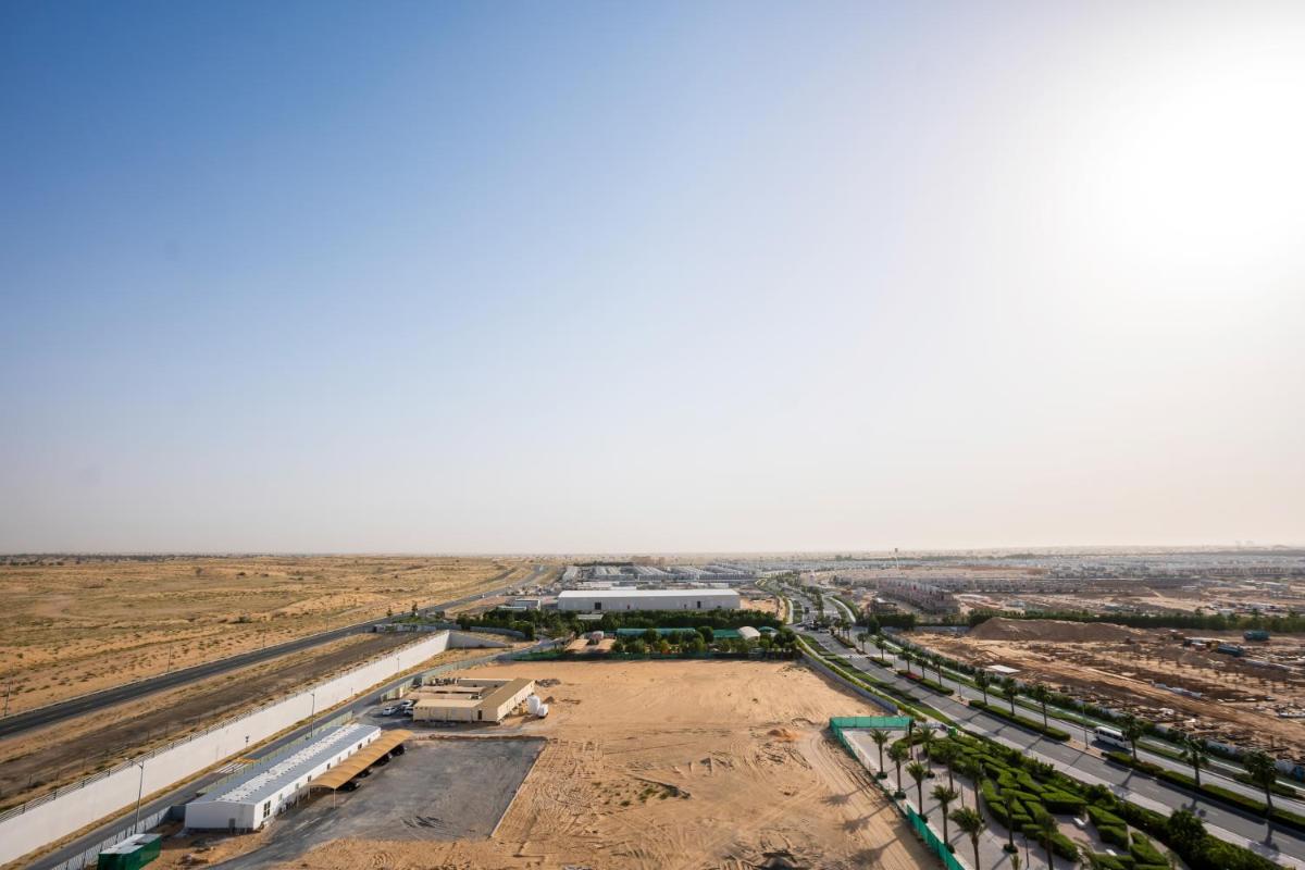 Homesgetaway - Elegant 2BRApt In Navitas A Damac Hills 2