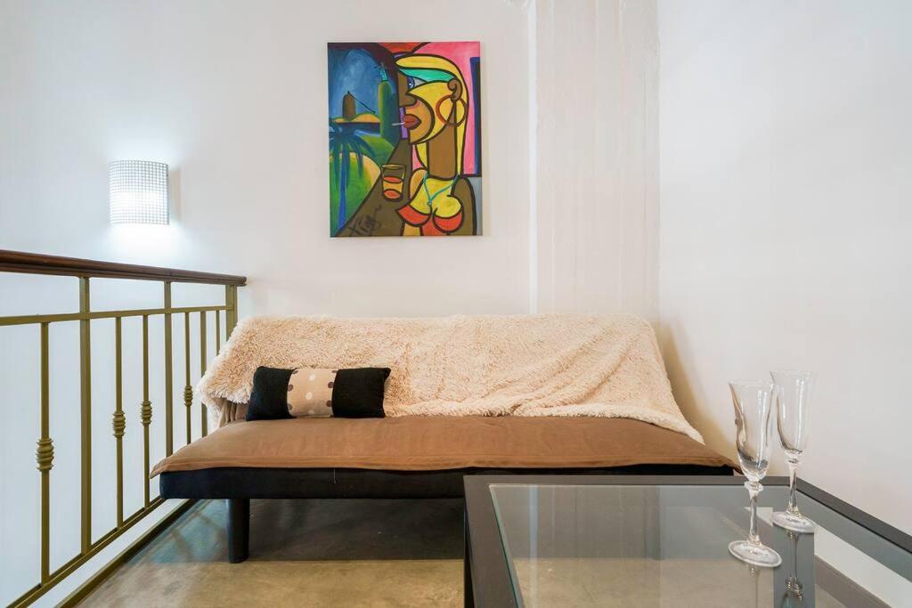 Bright loft with balcony overlooking the square