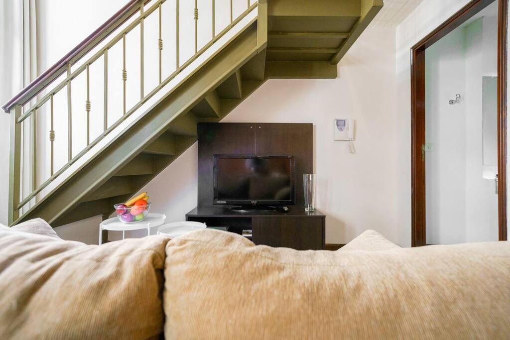 Bright loft with balcony overlooking the square