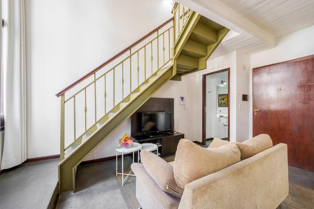 Bright loft with balcony overlooking the square