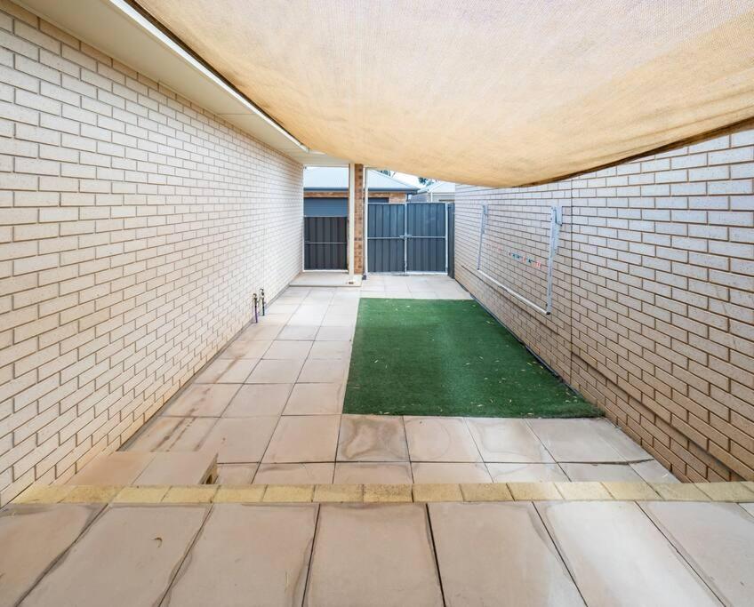 4 BR Home with Garage- short walk to shops, cafe, dining, and supermarkets
