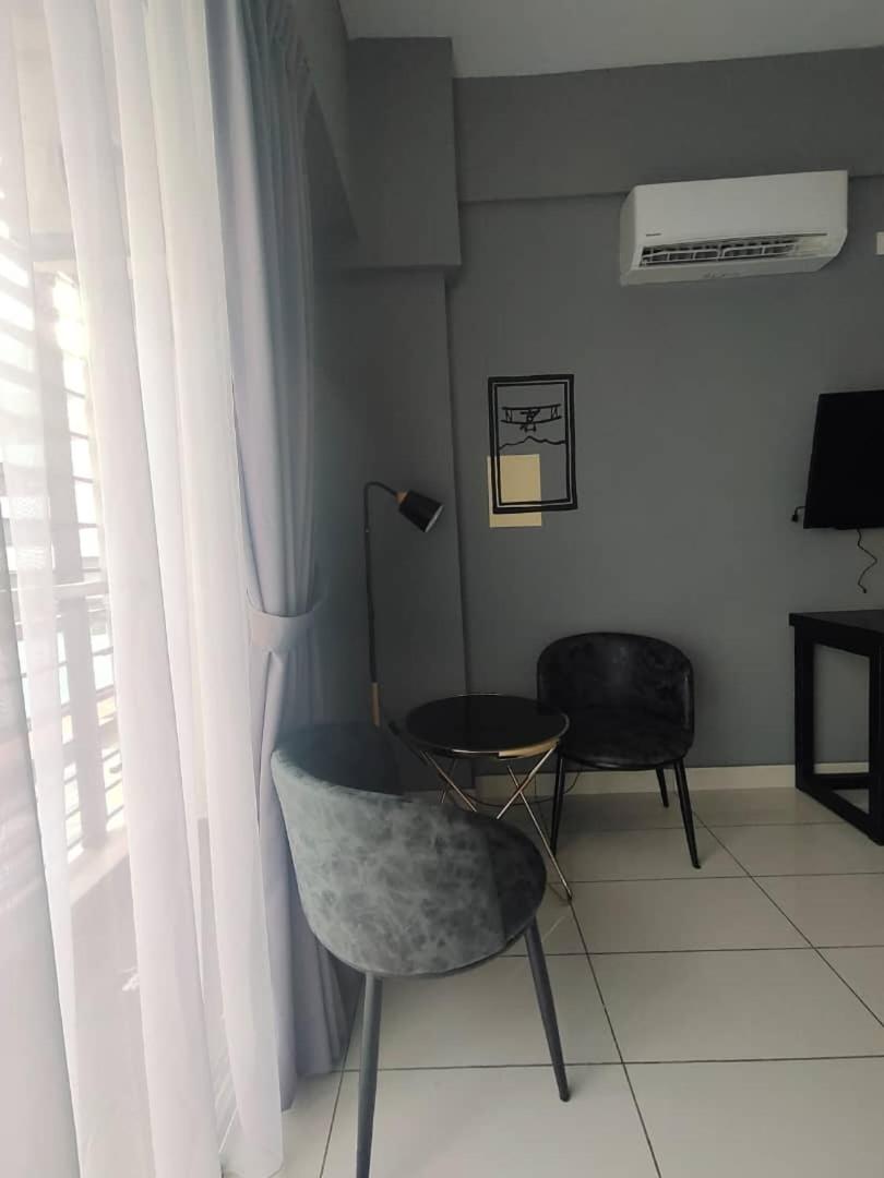 Aeropod Studio Room 3 Pax Low Level Near Airport and Tg Aru Beach photo 6