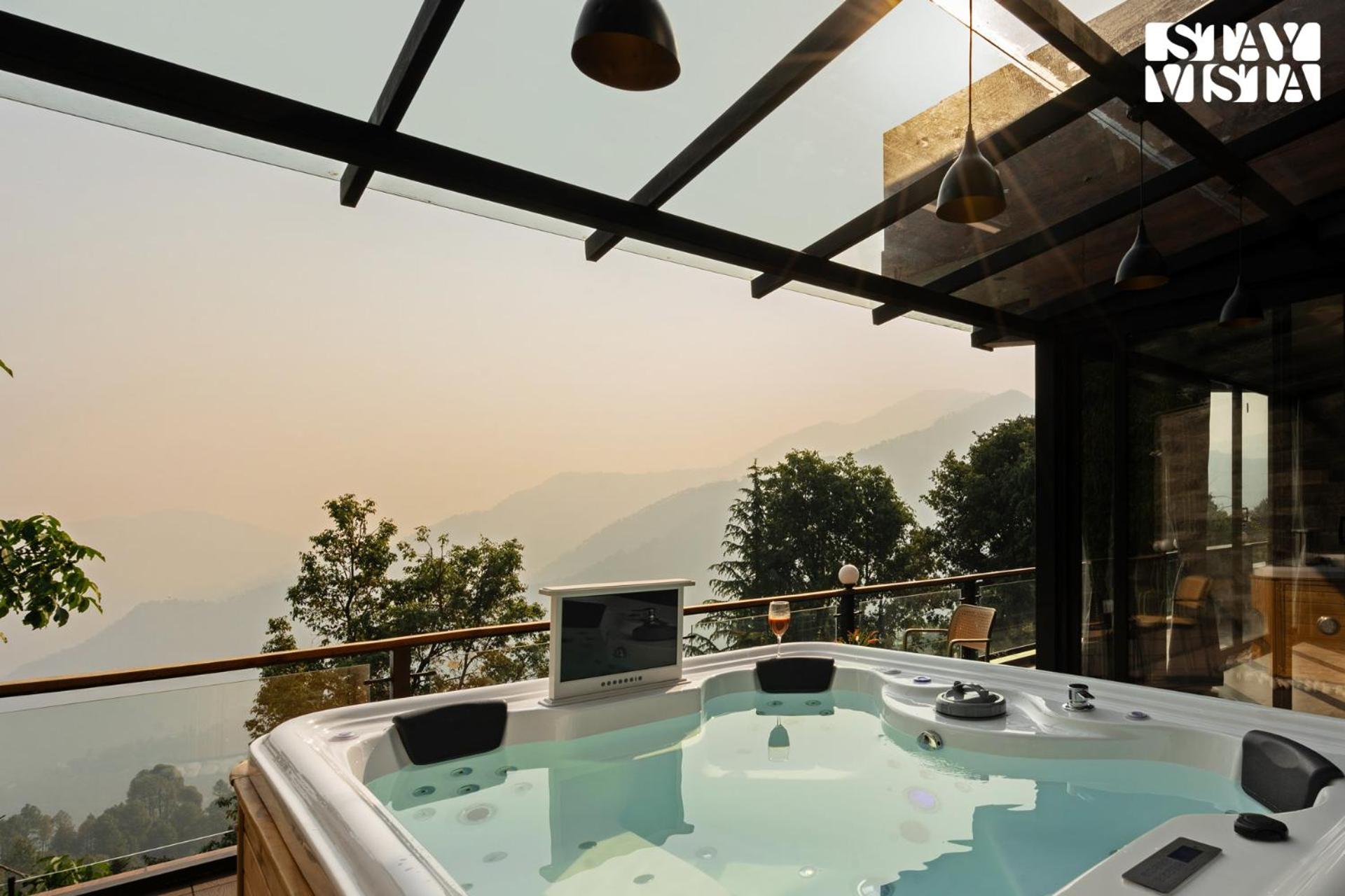 StayVista at Barkat Villa with Jacuzzi view 4