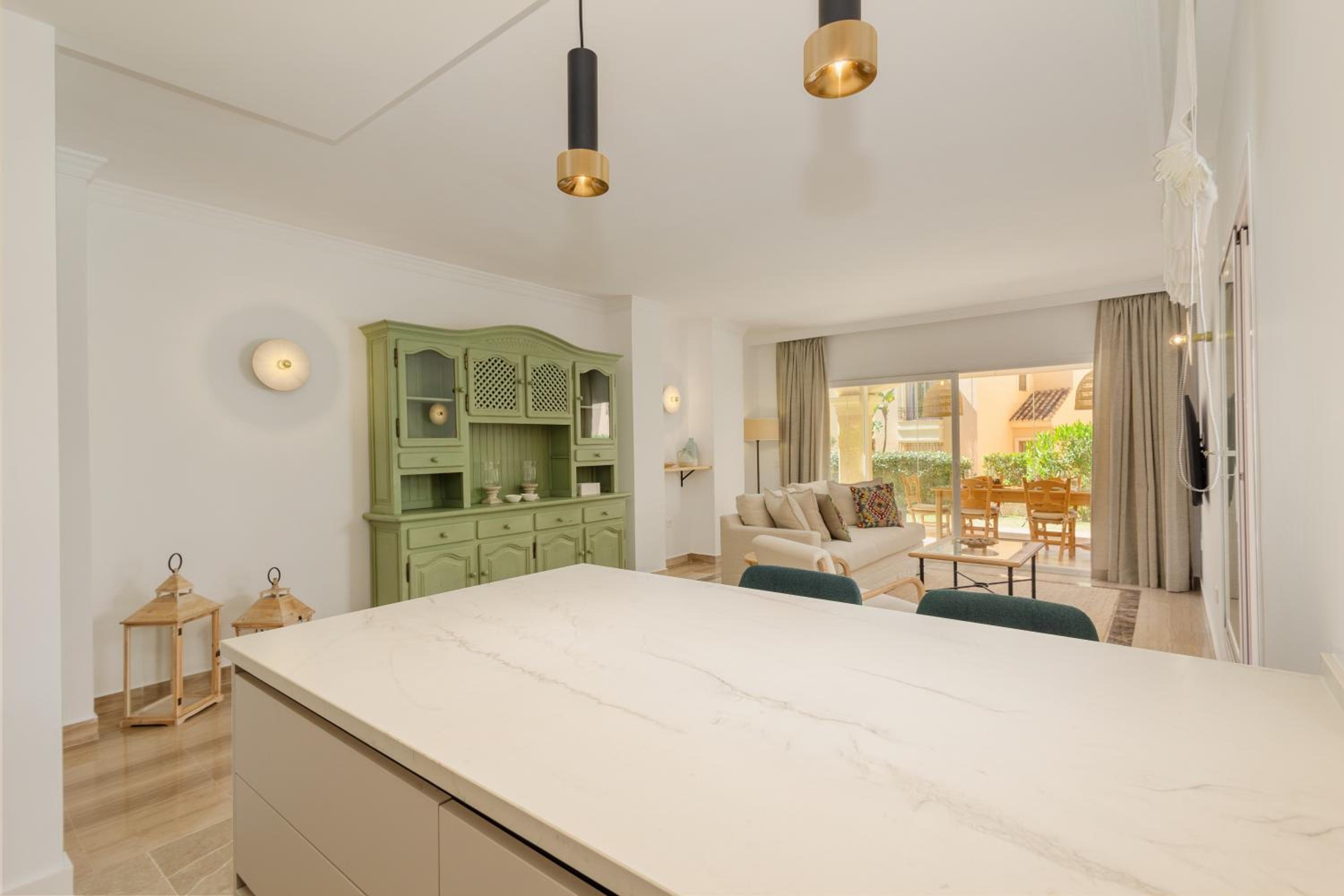 Newly renovated apartment with large private and glazed terrace, close to the beach in Elviria, Marbella East view 3