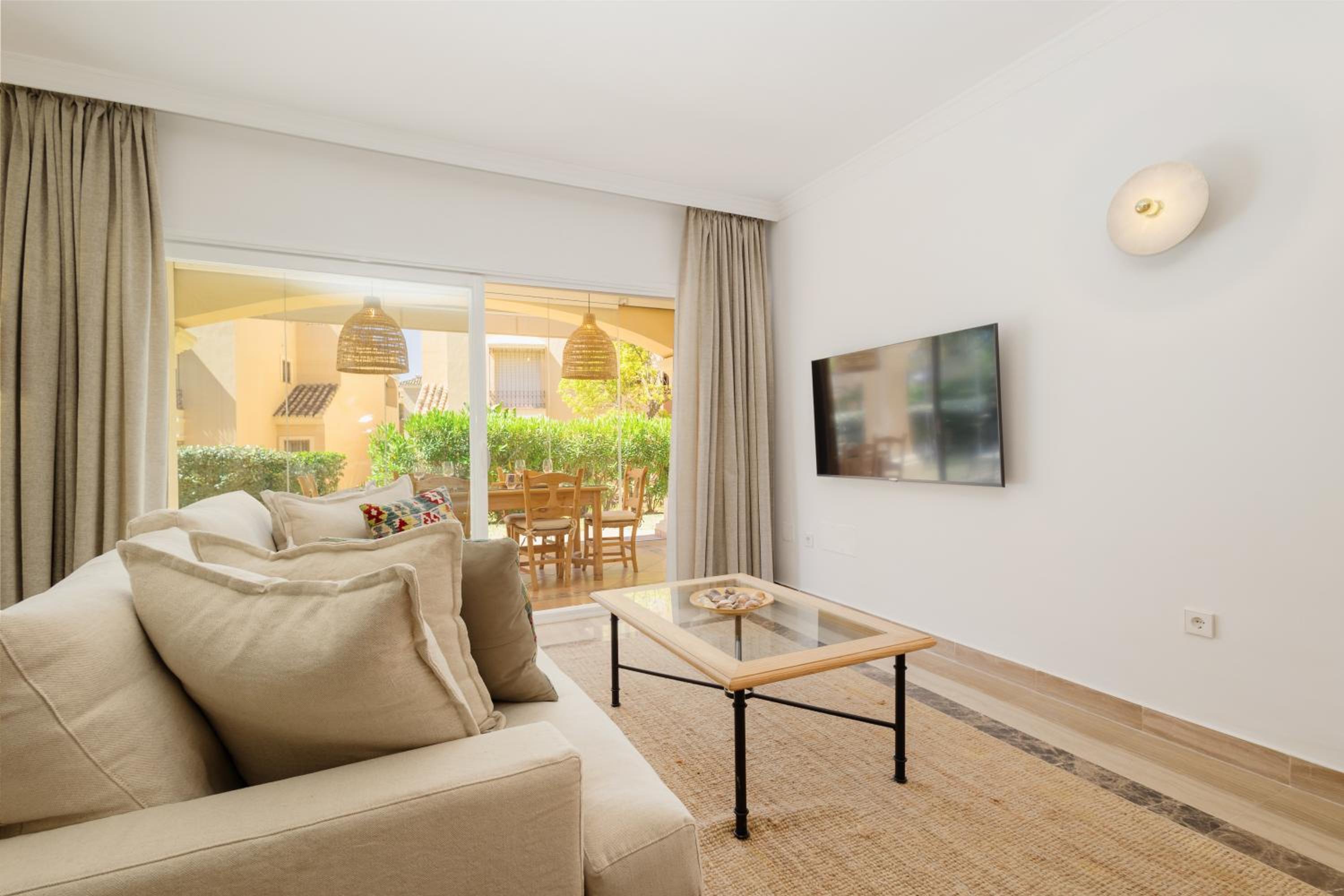 Newly renovated apartment with large private and glazed terrace, close to the beach in Elviria, Marbella East view 5