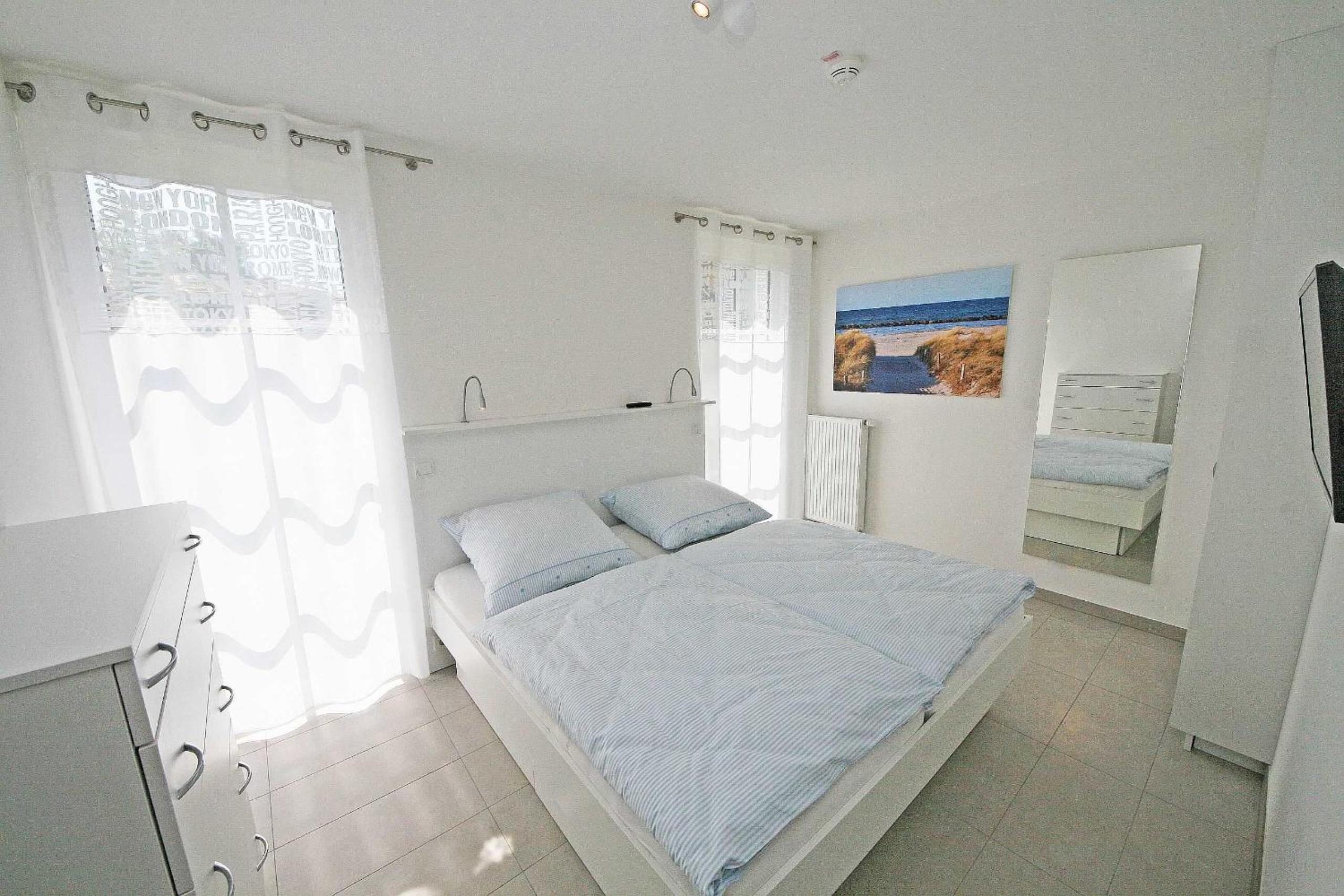 Haus Meeresblick - Ferienwohnung C 001 Dünenblick mit Terrasse