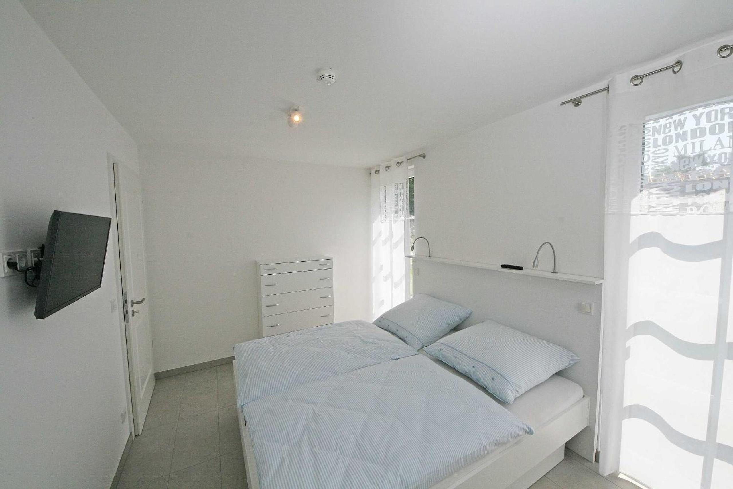 Haus Meeresblick - Ferienwohnung C 001 Dünenblick mit Terrasse