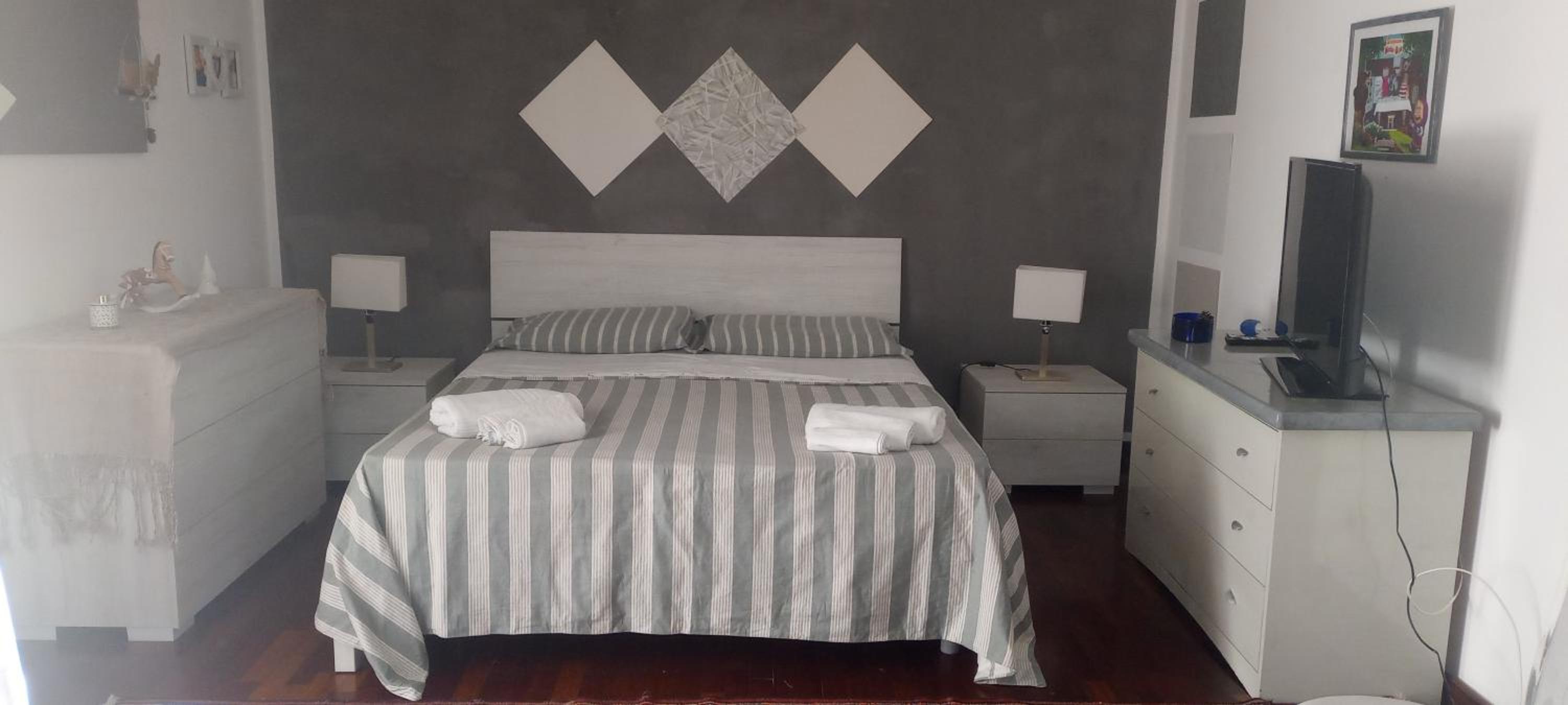 Don Camillo Suites en Riposto — hotel room