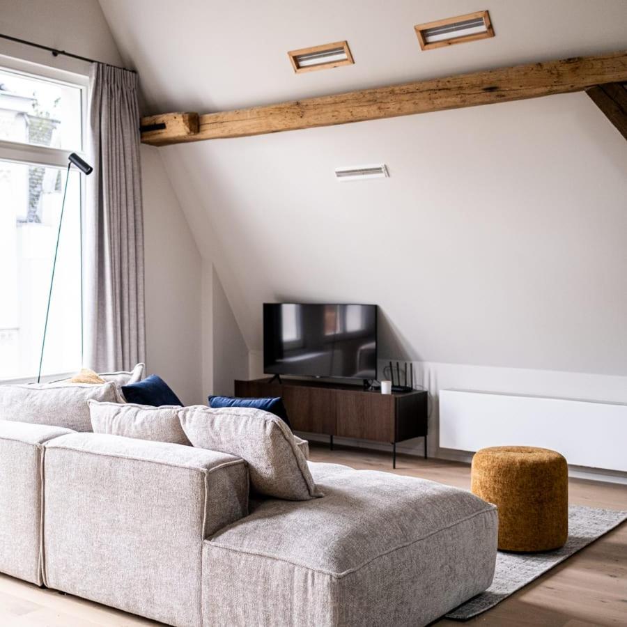 City-view loft with wooden beams and mezzanine