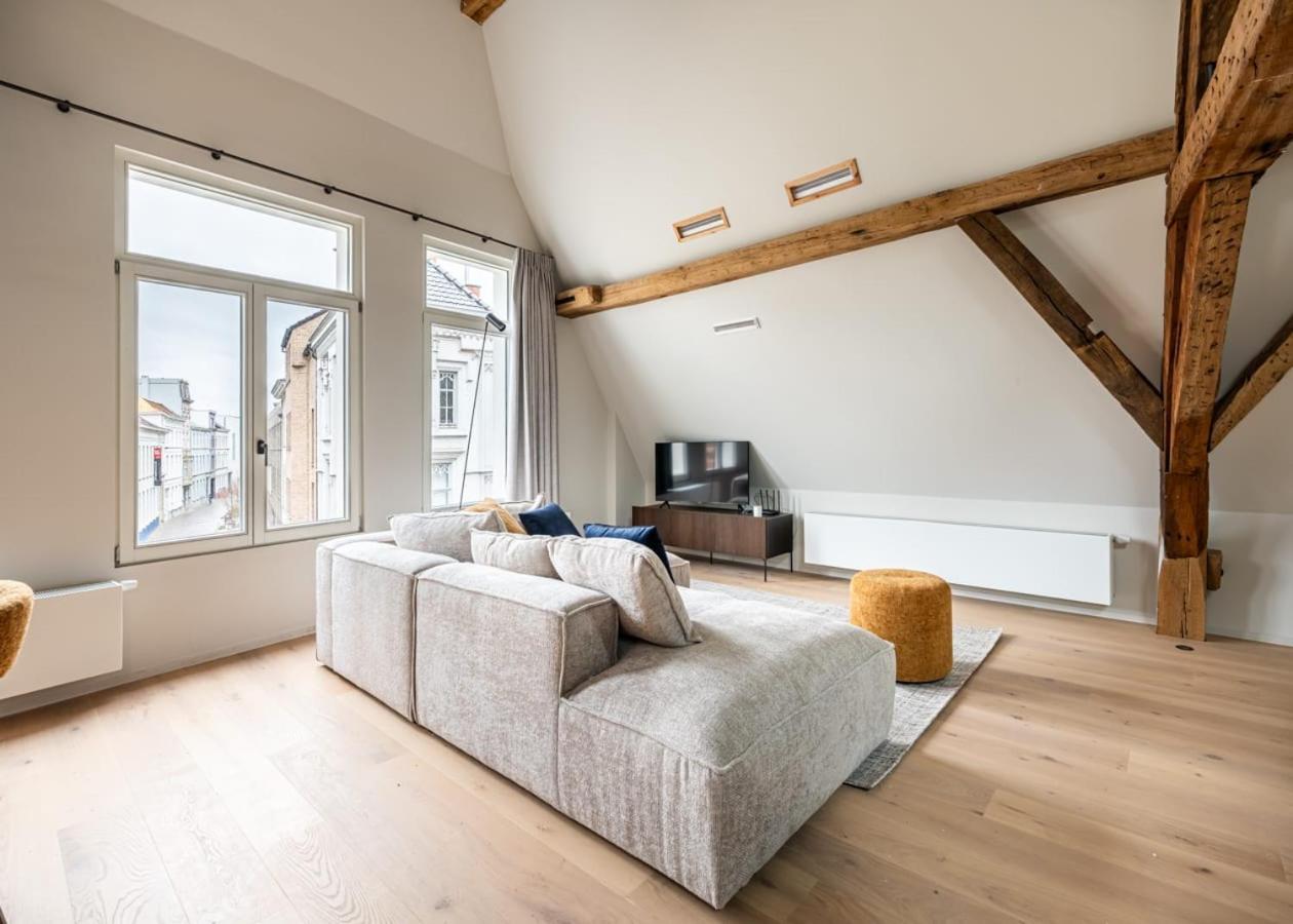 City-view loft with wooden beams and mezzanine