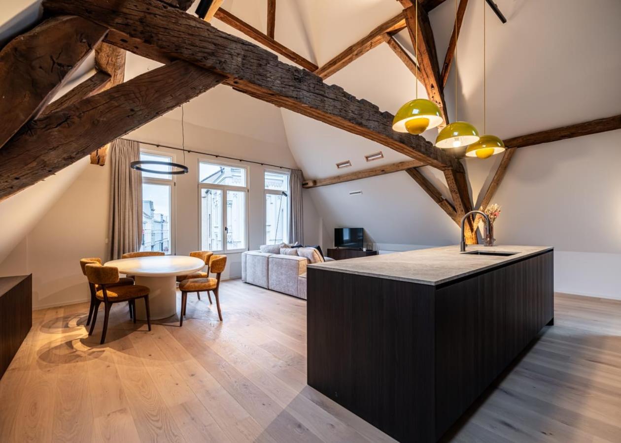 City-view loft with wooden beams and mezzanine