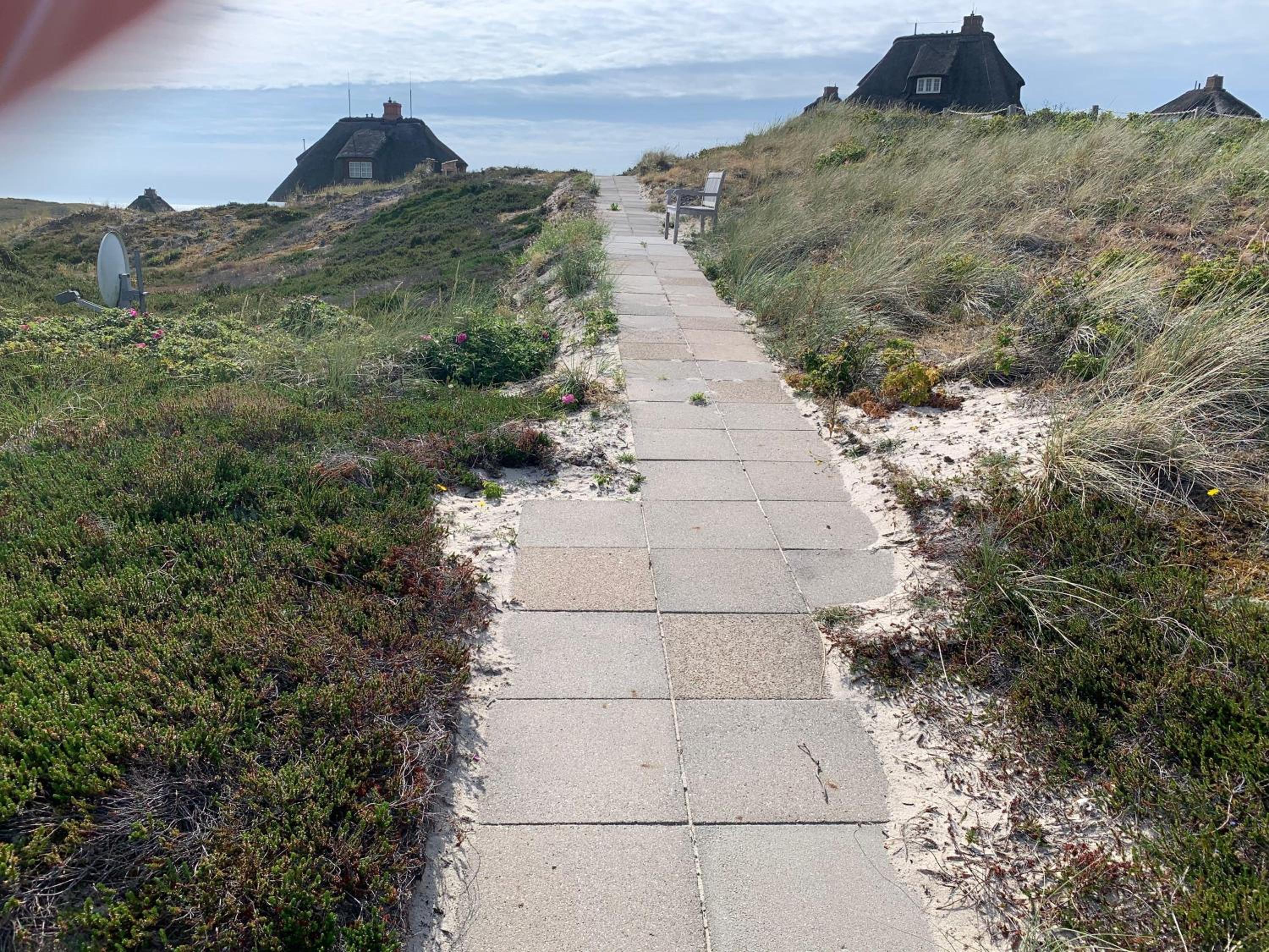 Meerblickhaus-Hoppe-mit-Panoramabank-auf-Sylt