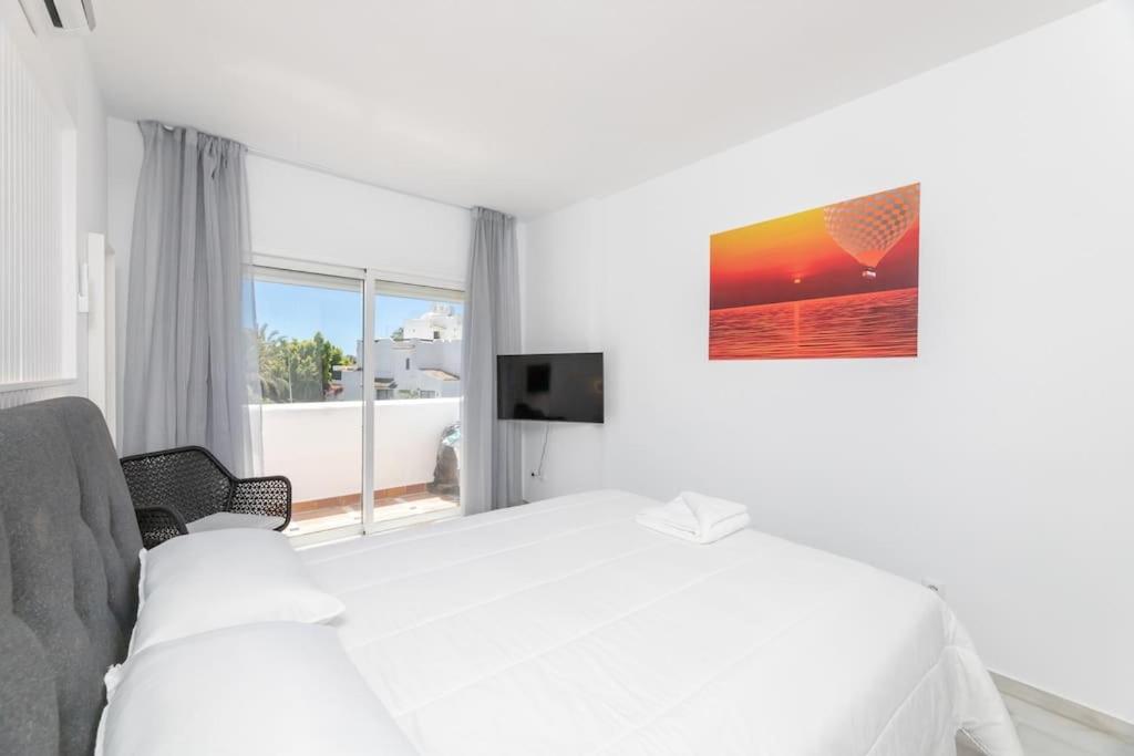 NEW duplex penthouse walk to beach and port RDR216 view 5