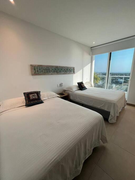 Edificio Playa dormida 2 con Piscina y playa