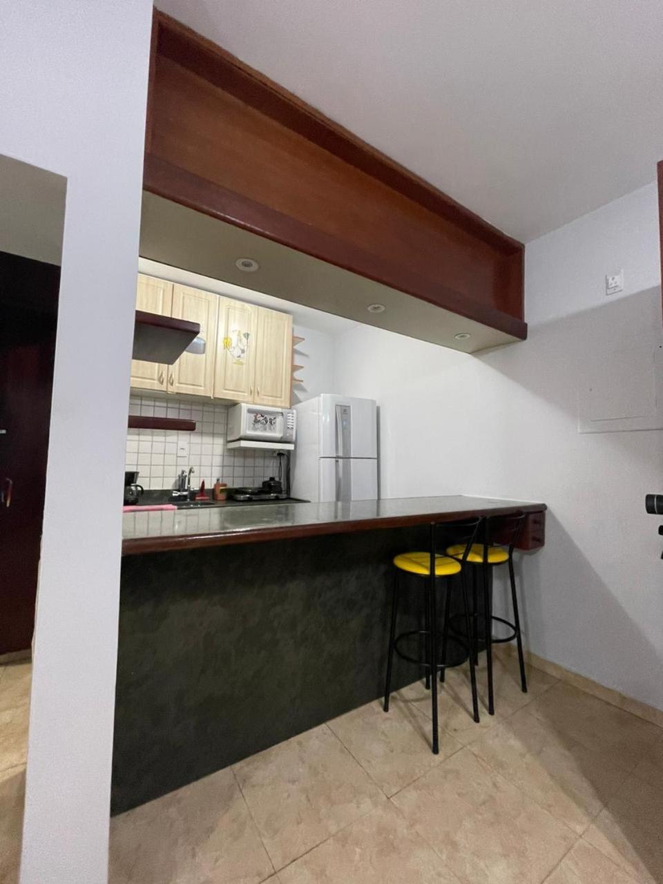Flat com piscina ao lado da praia