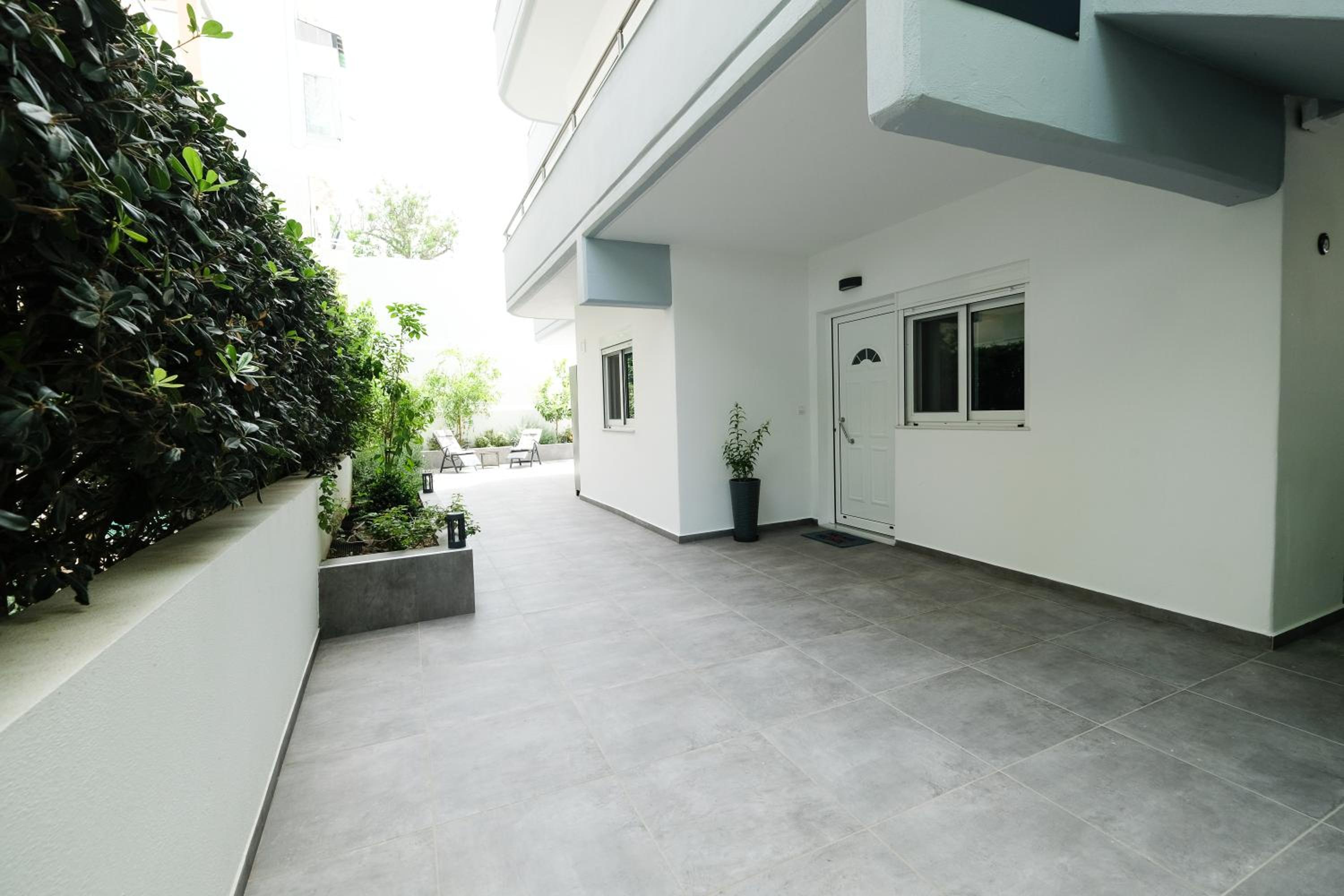 Rhodes Retreat: Modern Comfort in Serene Luxury view 4