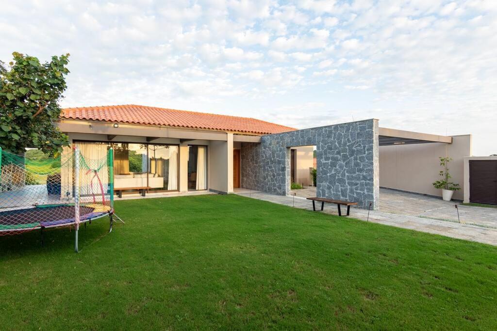 Vista deslumbrante, 4 suítes, piscina, prox golfe