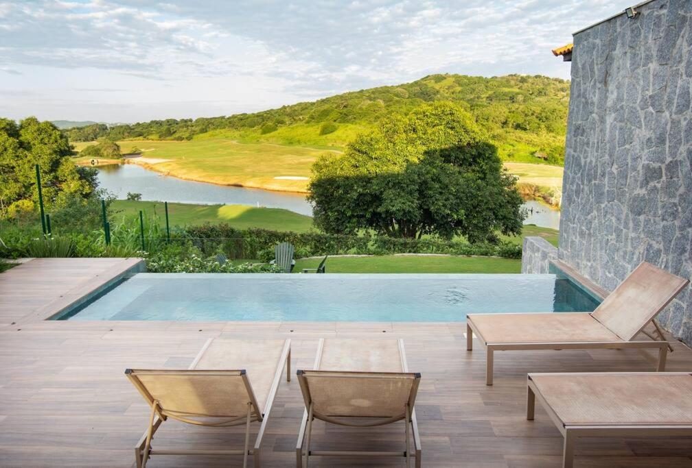 Vista deslumbrante, 4 suítes, piscina, prox golfe