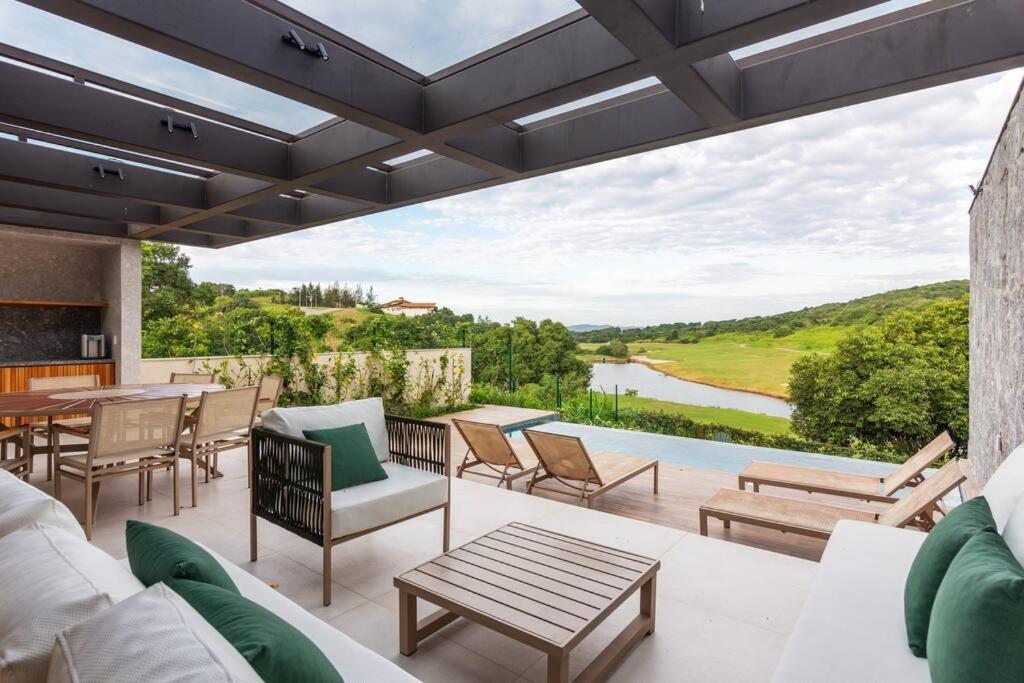 Vista deslumbrante, 4 suítes, piscina, prox golfe