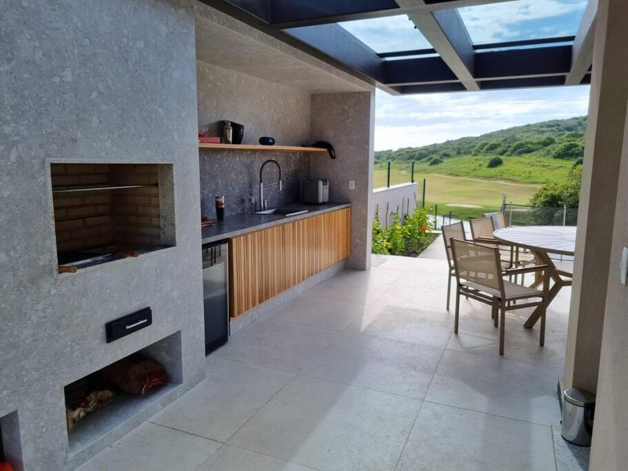 Vista deslumbrante, 4 suítes, piscina, prox golfe