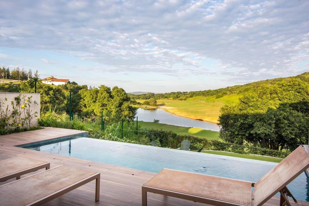 Vista deslumbrante, 4 suítes, piscina, prox golfe