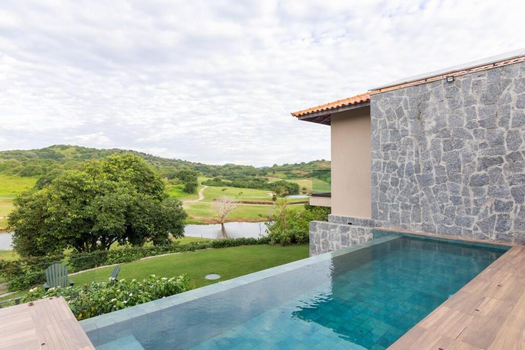 Vista deslumbrante, 4 suítes, piscina, prox golfe