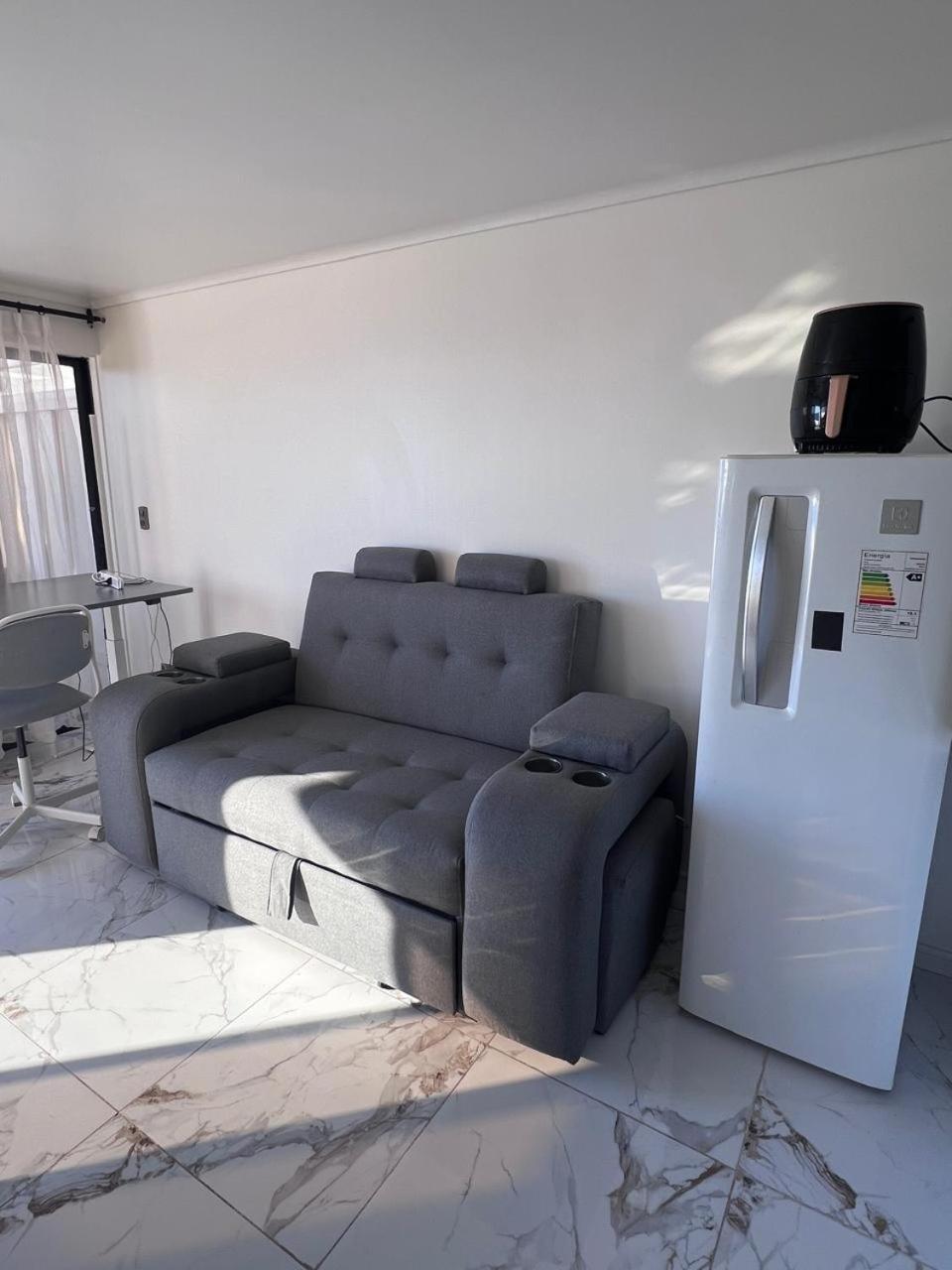 Moderno departamento con dormitorio y terraza con vista al mar y parrilla en Reñaca
