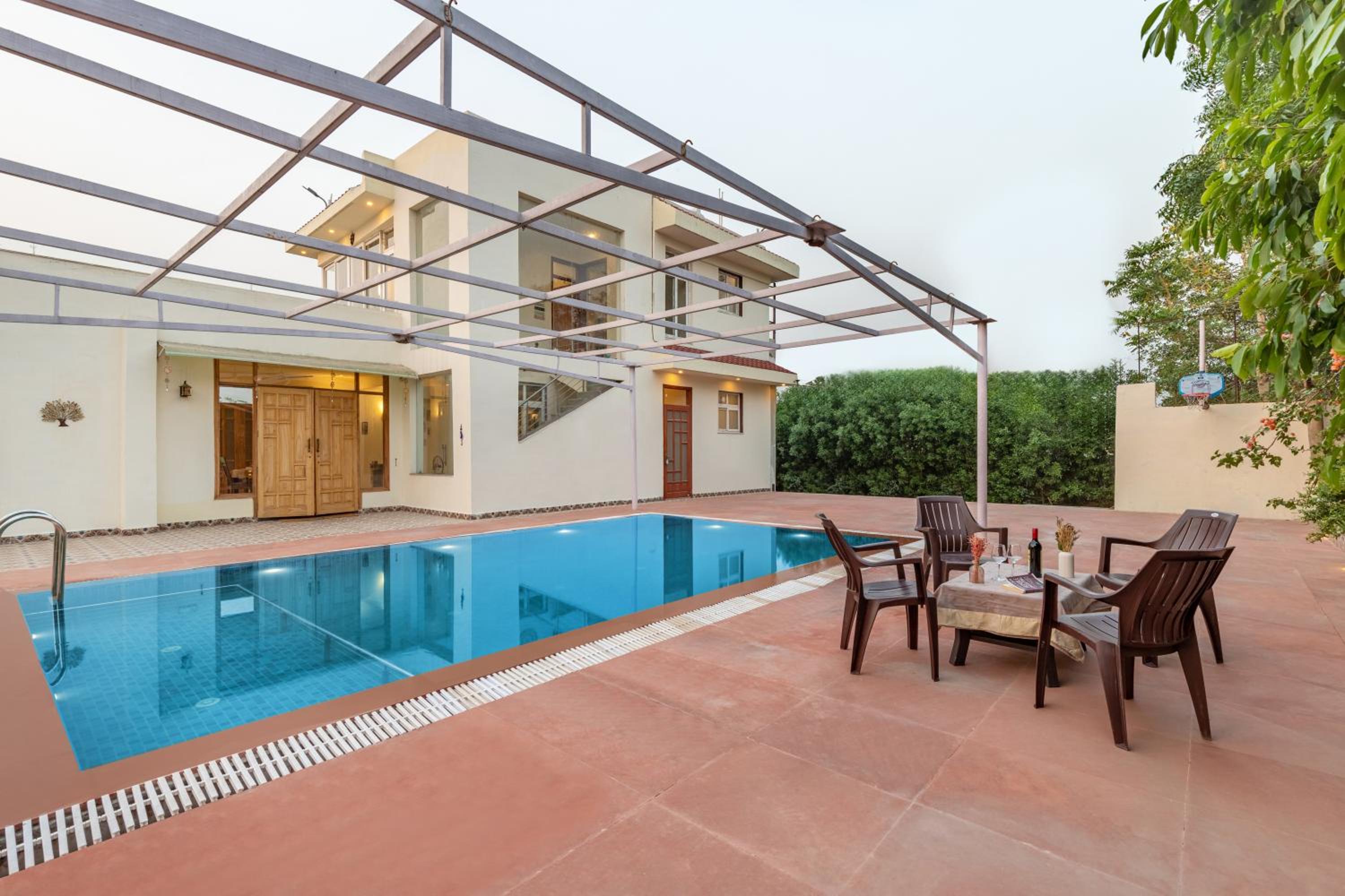 Alaya Stays Raga 2BHK Farmstay with an entertainment lounge view 5