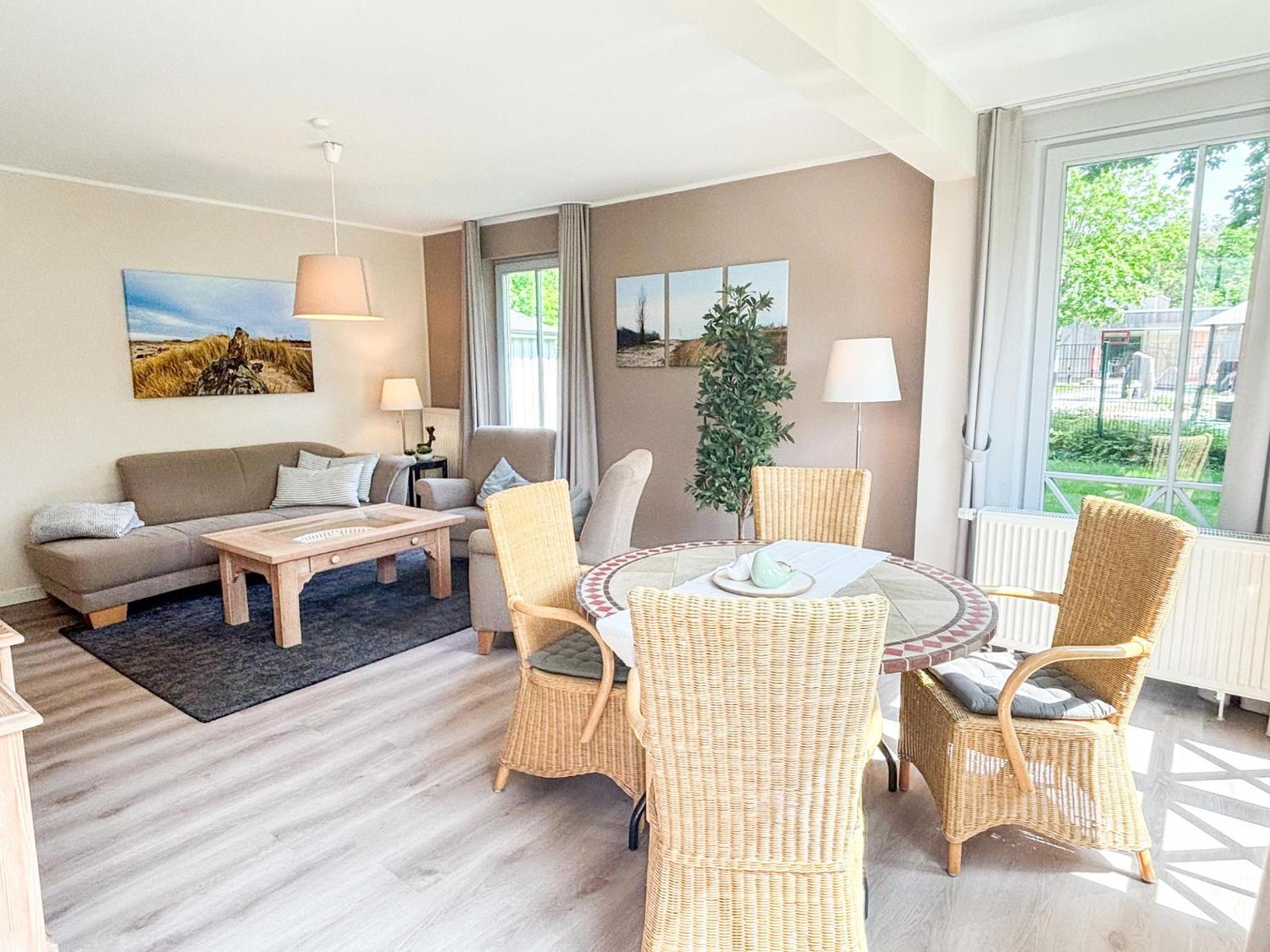 Großzügige Whg. mit verglaster Veranda, geschützter Terrasse