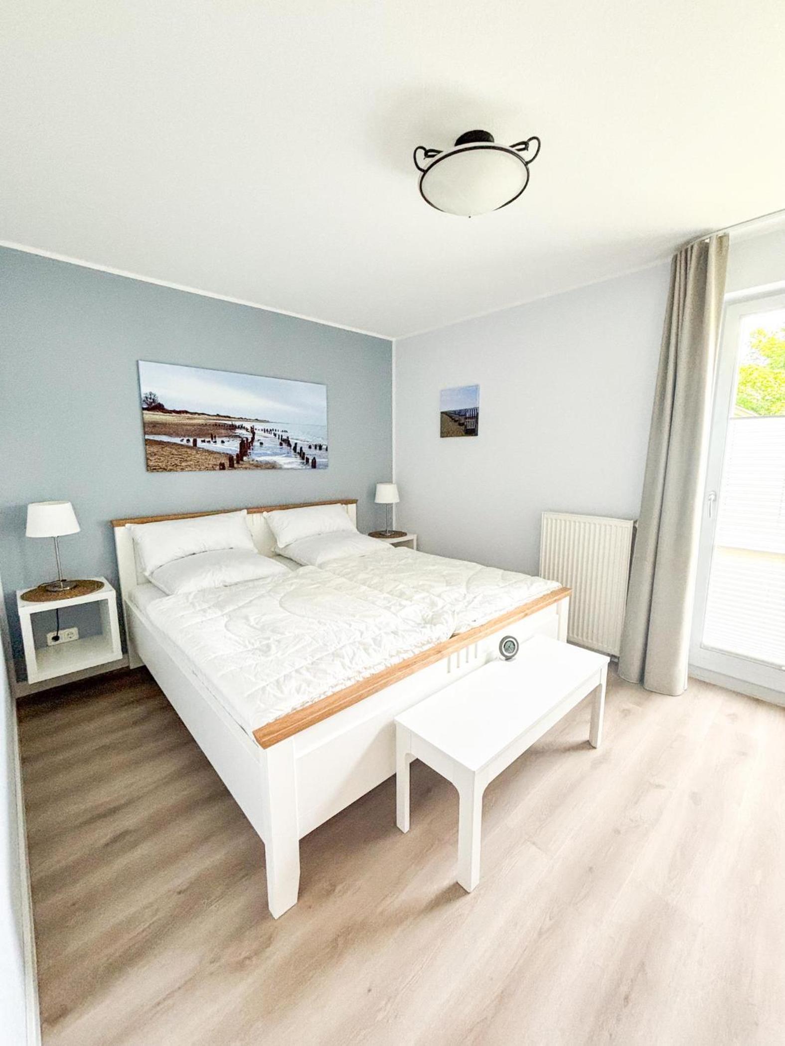 Großzügige Whg. mit verglaster Veranda, geschützter Terrasse