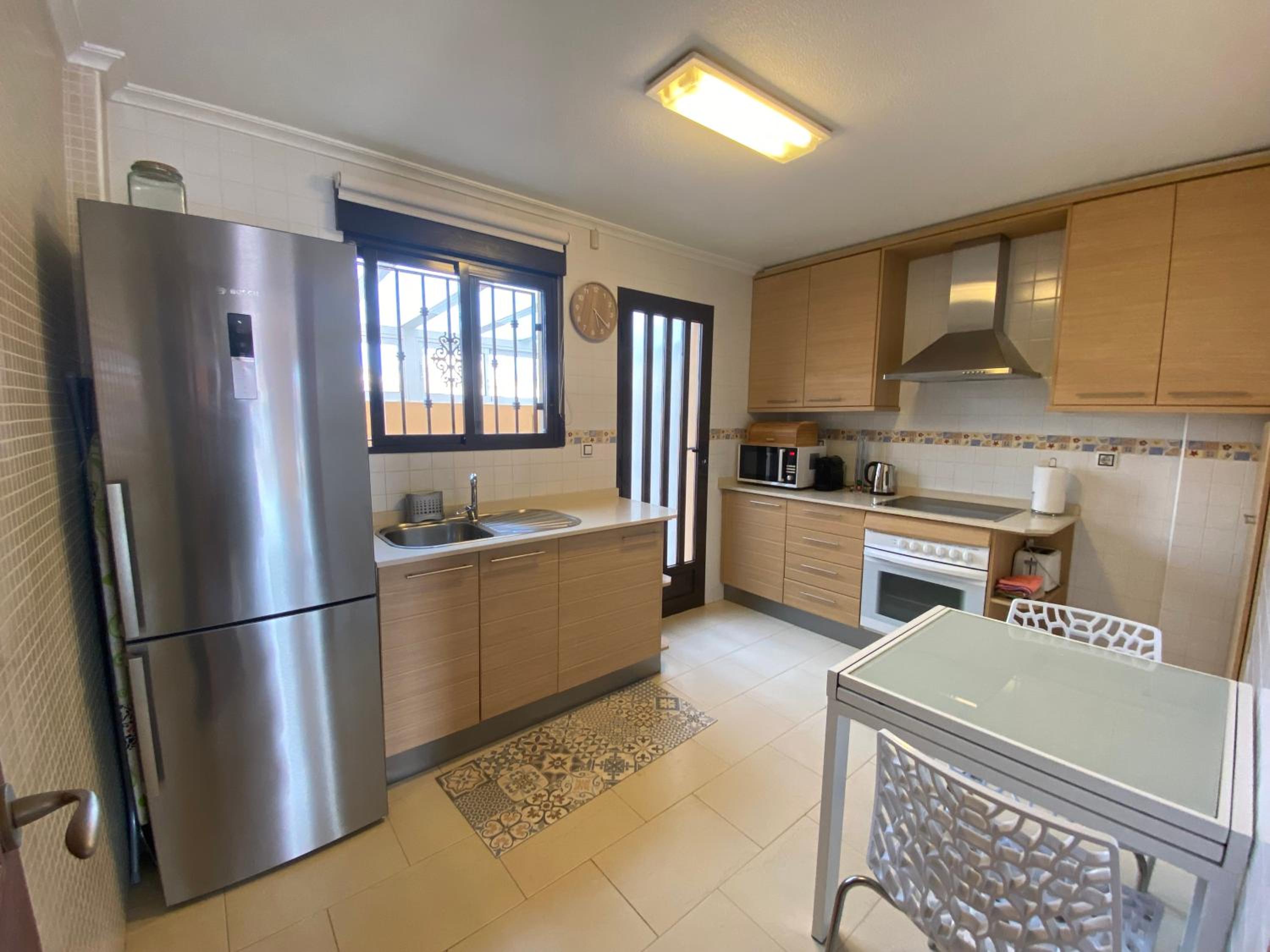 Holiday home with pool view and garden
