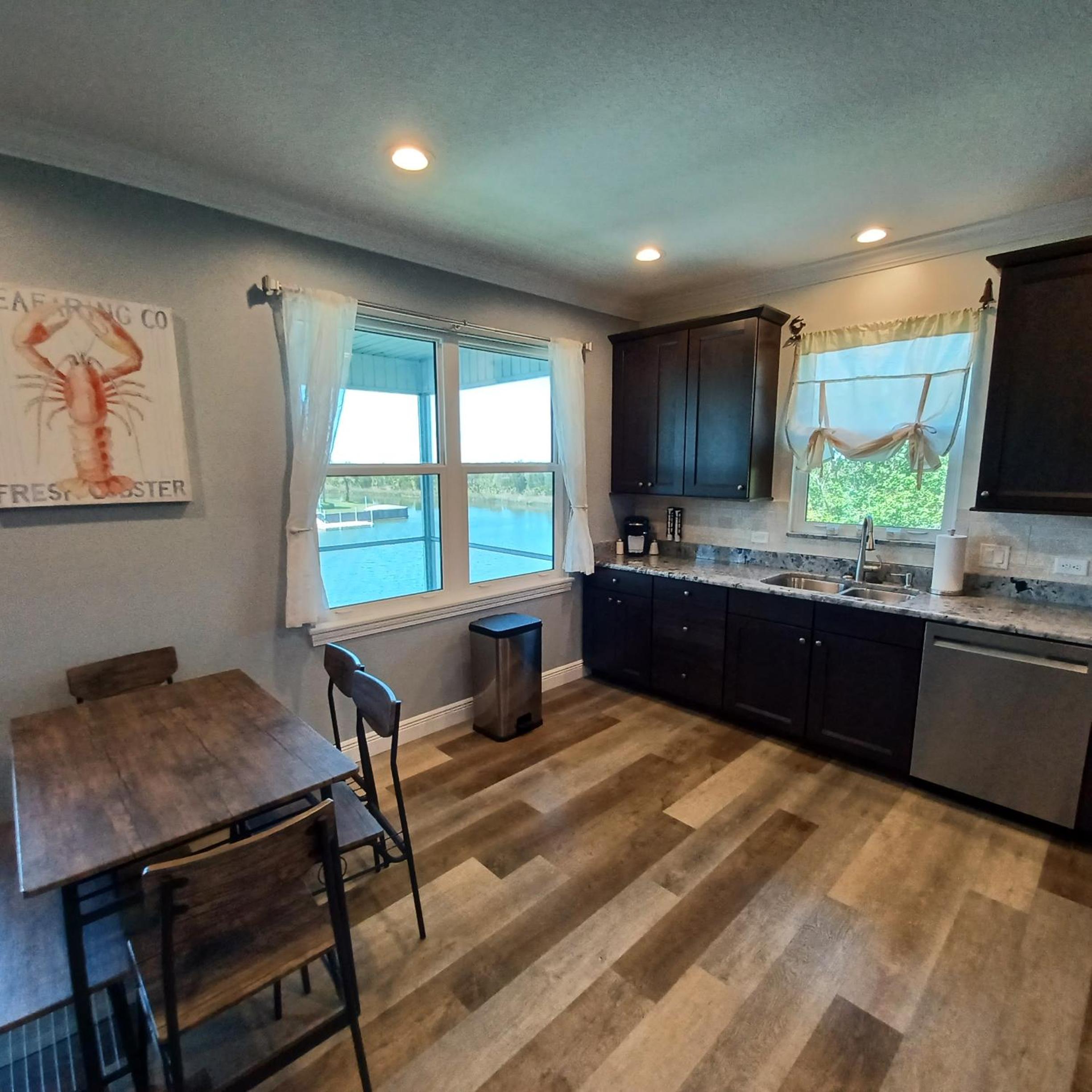 Newly Remodeled Gulf Canal Home With Floating Dock and Kayaks