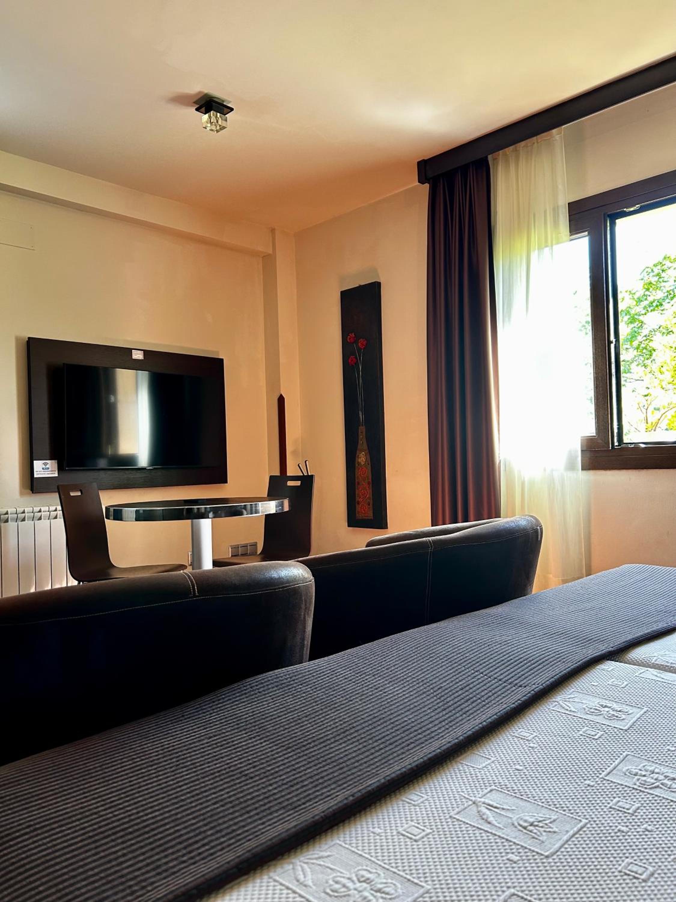 Apartamentos Rurales L'Arquera