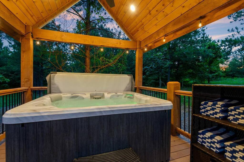 Luxury Top Rated Cabin! Hot Tub - Fire Pit - Decks - Game Room - Walk to Town view 4