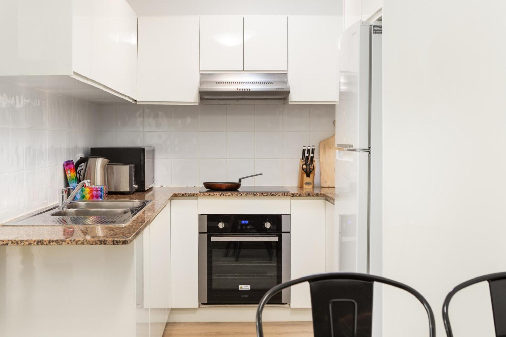 Suburban Two-bed Apartment with Parking and Patio