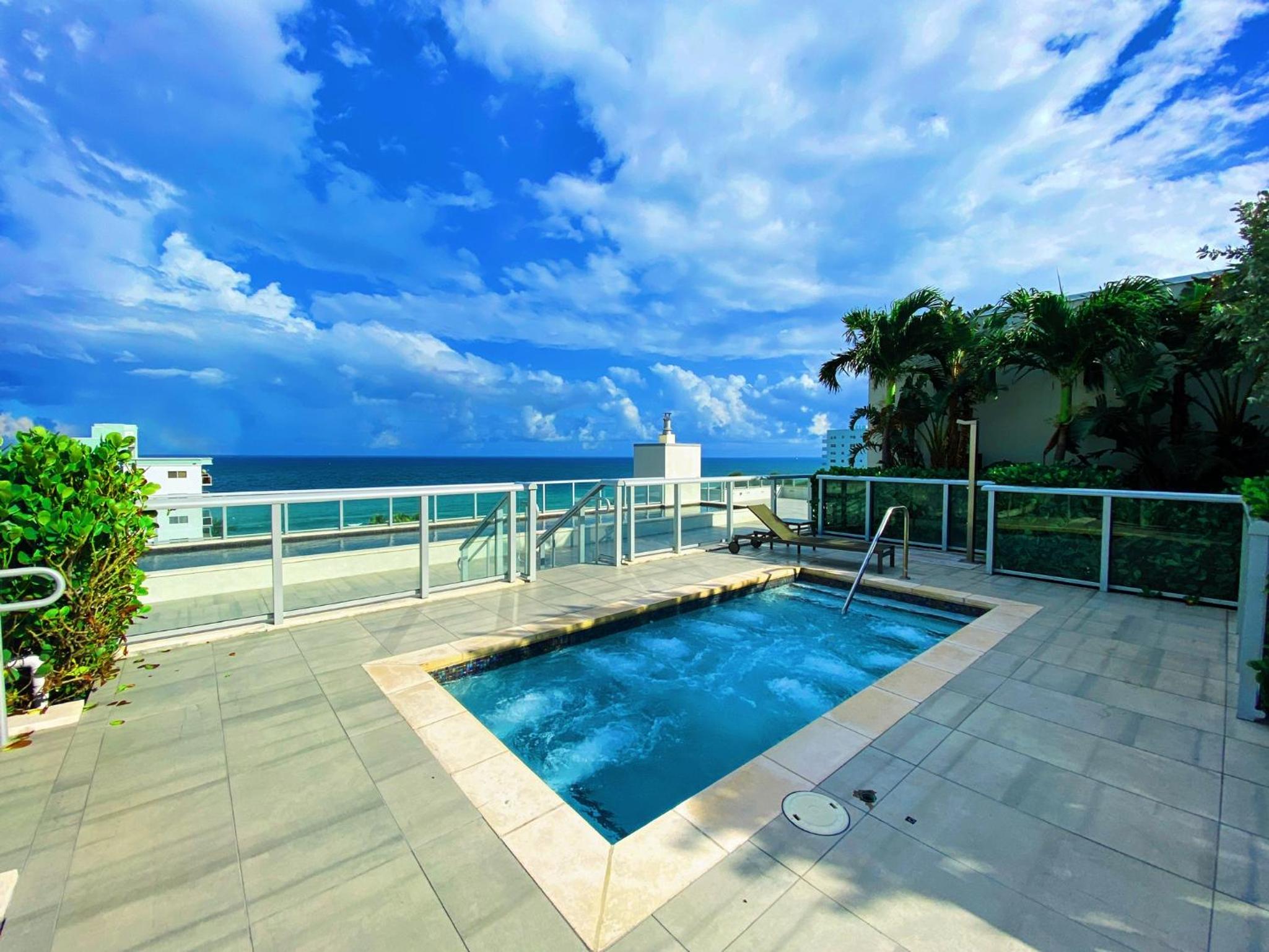 Stylish 3BR Resort Condo with Beach Access, Two Infinity Pools and Private Balcony - 25 min to FIFA! view 4