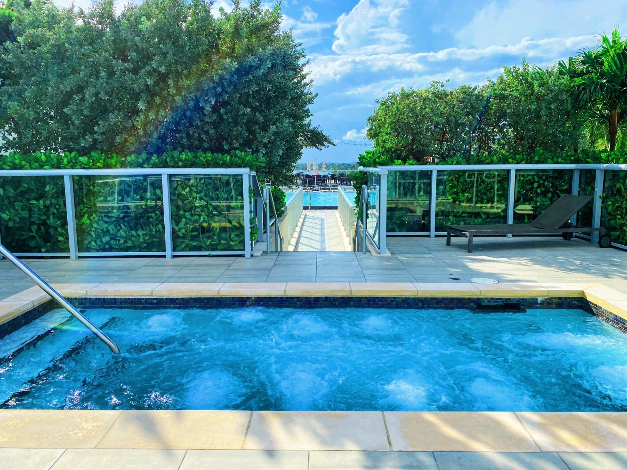 Stylish 3BR Resort Condo with Beach Access, Two Infinity Pools and Private Balcony - 25 min to FIFA! view 5