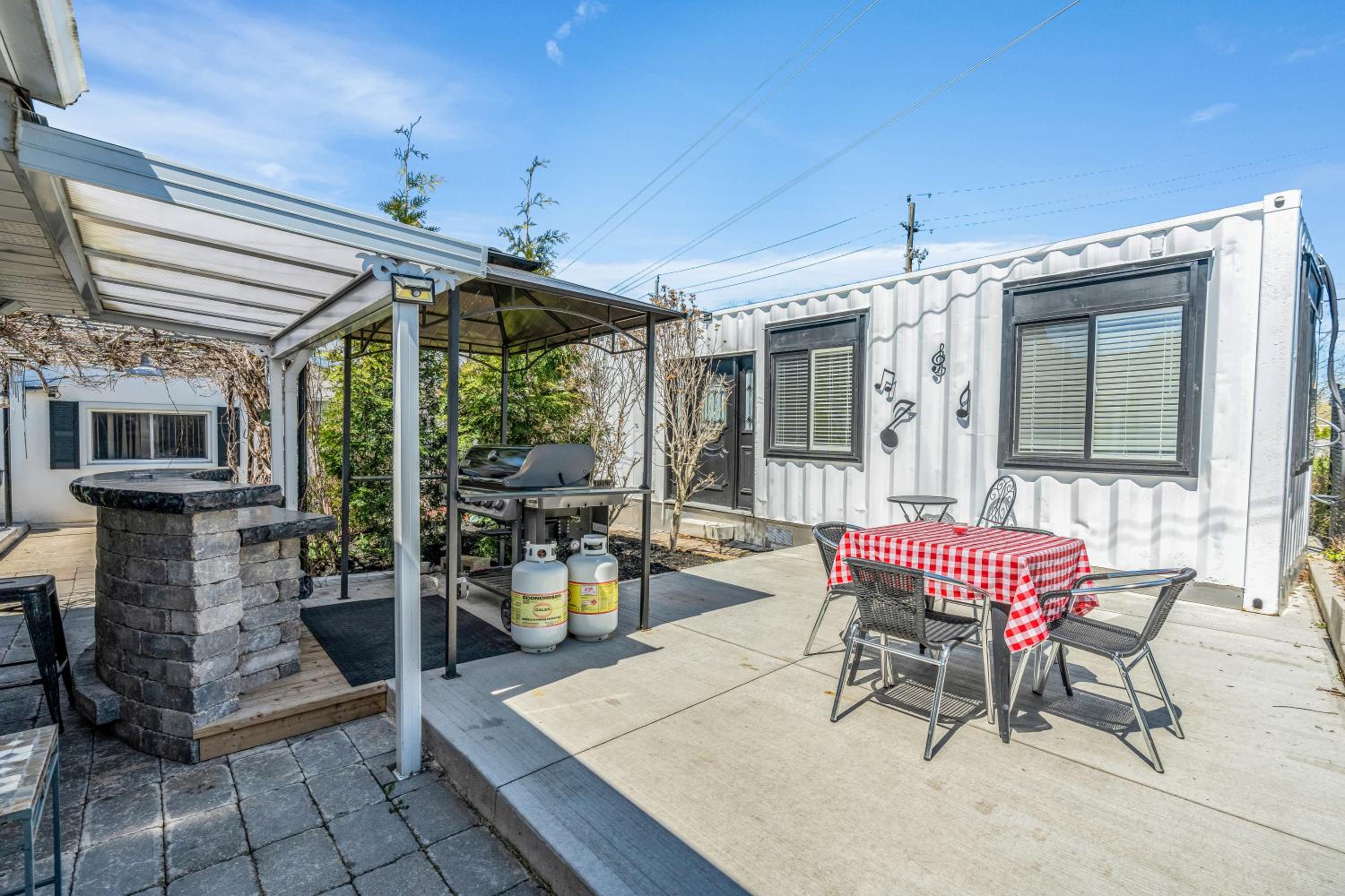 One of a Kind Stay Container Tiny Home by Falls