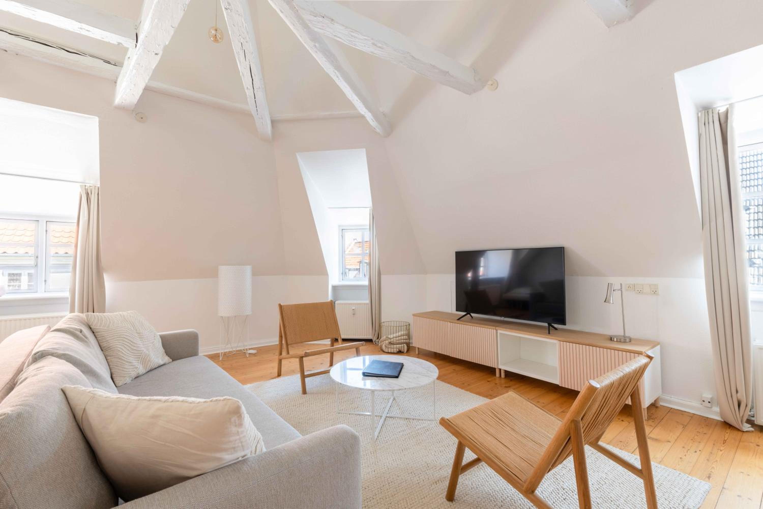 Unique Apartment w Exposed Beams Next to Tivoli